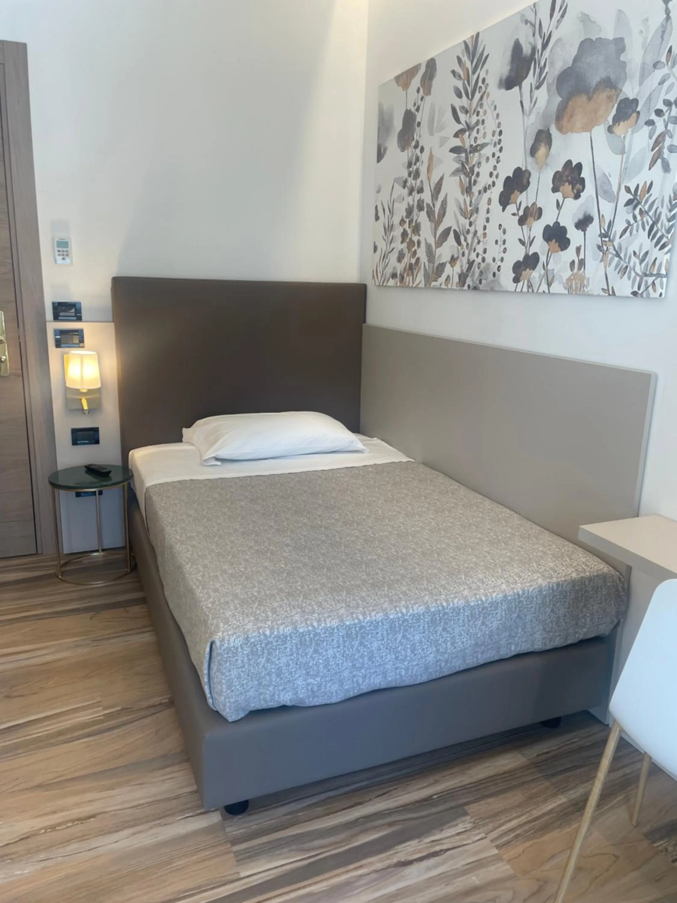 Bed in Hotel Tritone