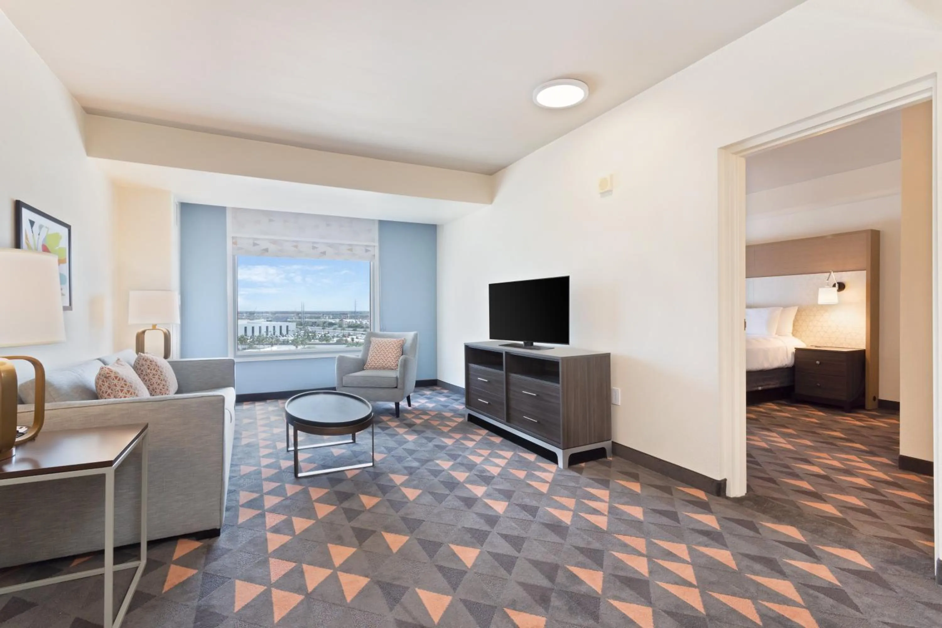 Photo of the whole room, Bed in Holiday Inn & Suites Across from Universal Orlando by IHG