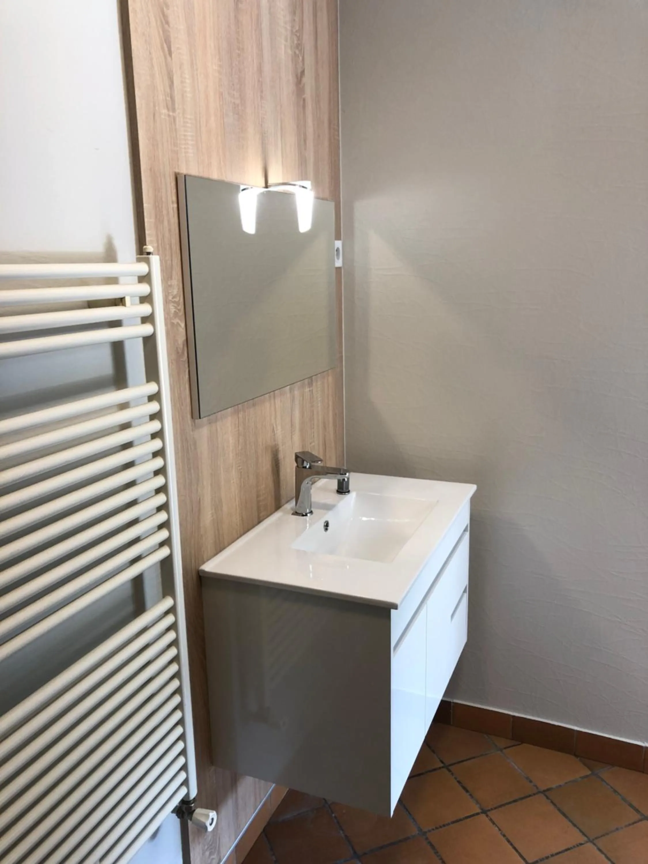 Bathroom in LOGIS - Hôtel & Restaurant Saint Nicolas