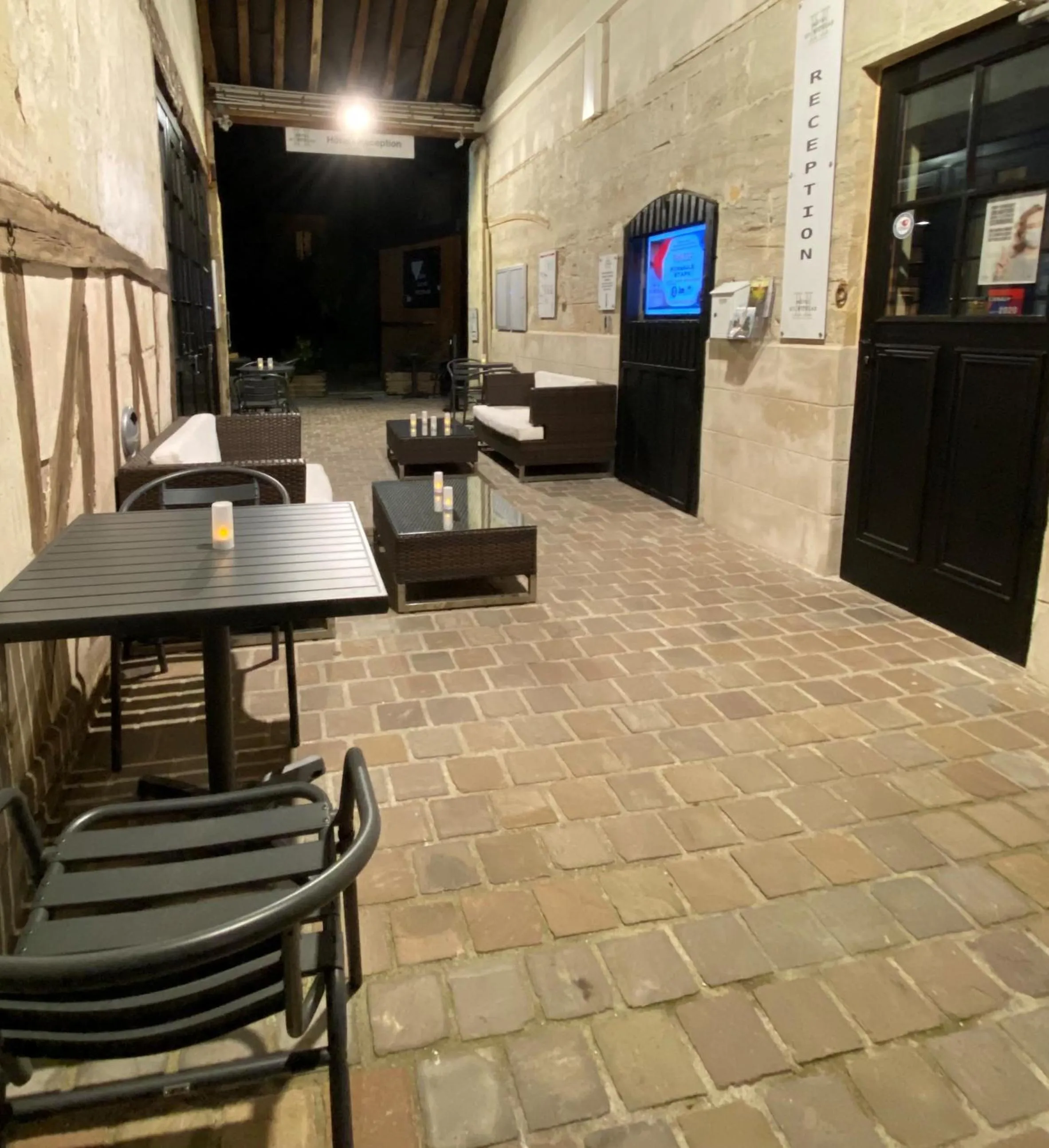 Patio in LOGIS - Hôtel & Restaurant Saint Nicolas