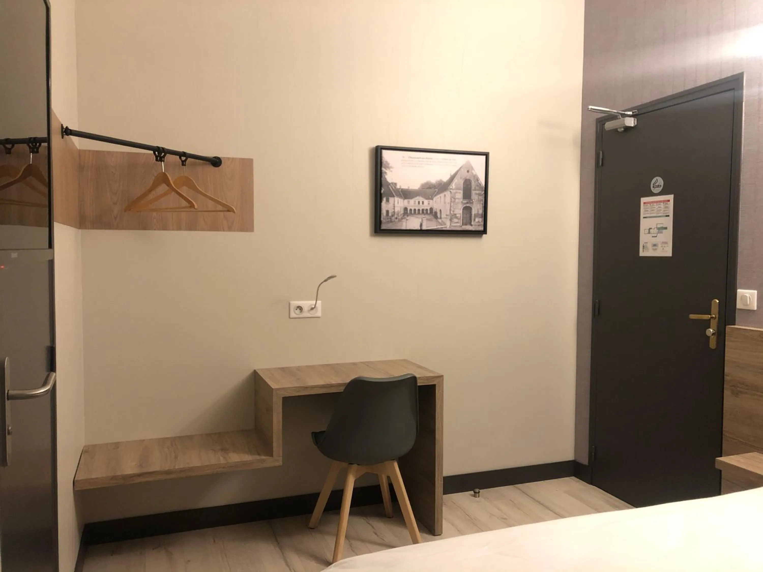 Seating area in LOGIS - Hôtel & Restaurant Saint Nicolas