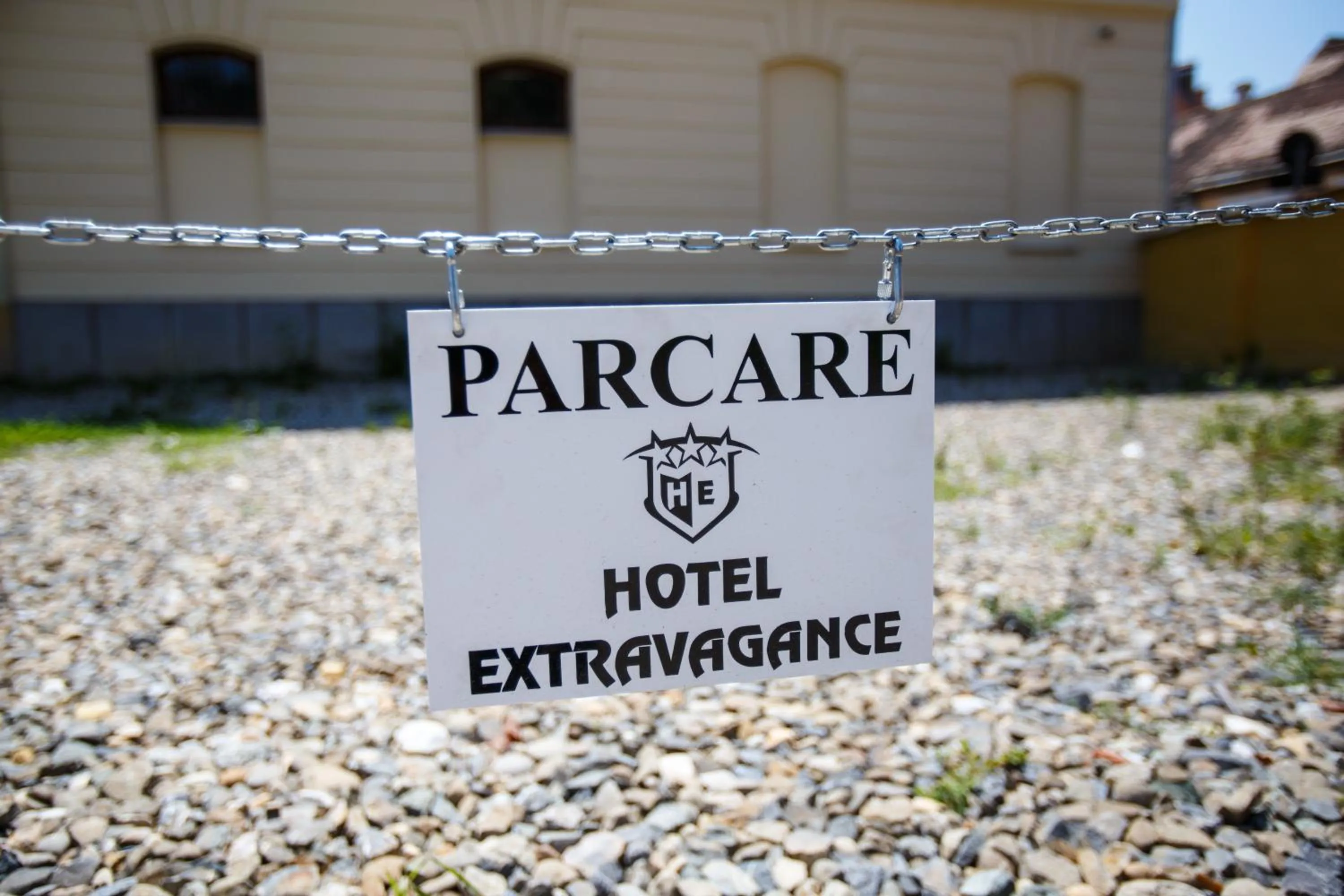 Property logo or sign in Extravagance Hotel