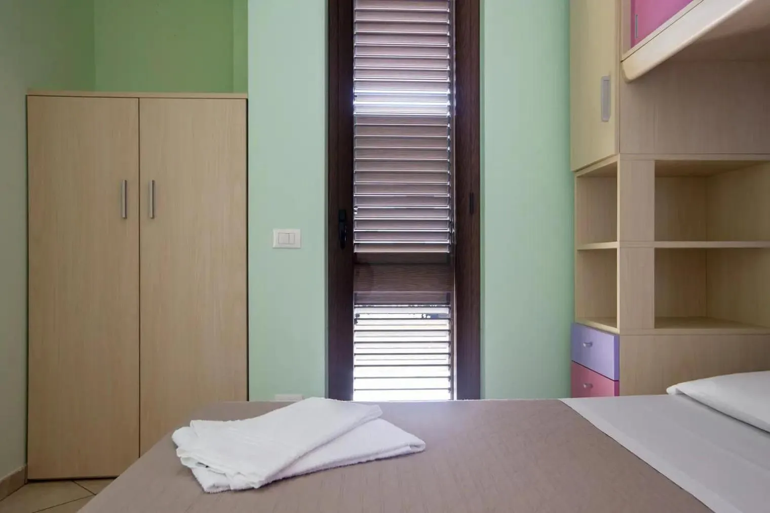 Bed in Appartamenti Anzà