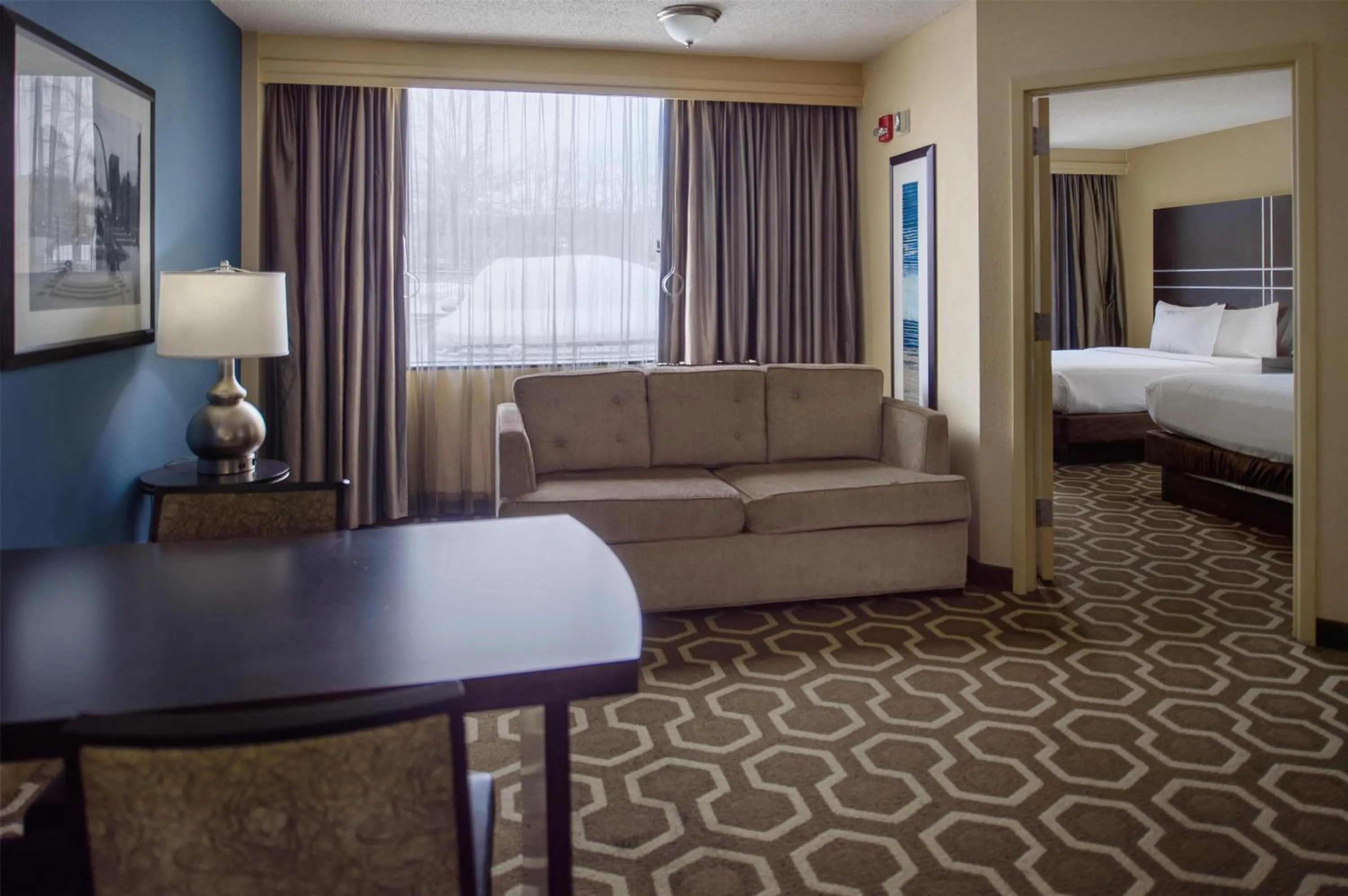 Living room, Bed in Embassy Suites by Hilton St Louis Airport