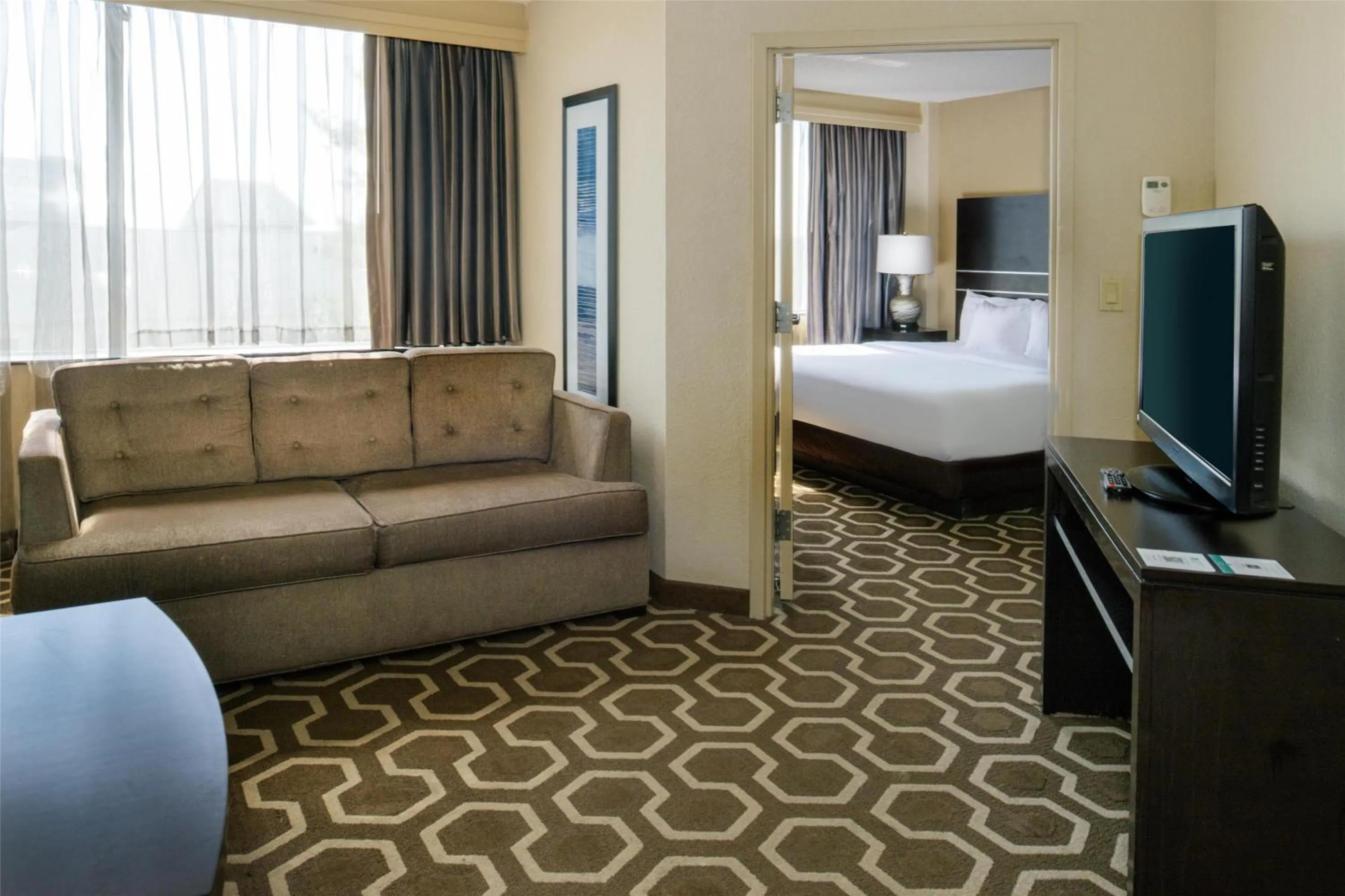 Living room, Bed in Embassy Suites by Hilton St Louis Airport