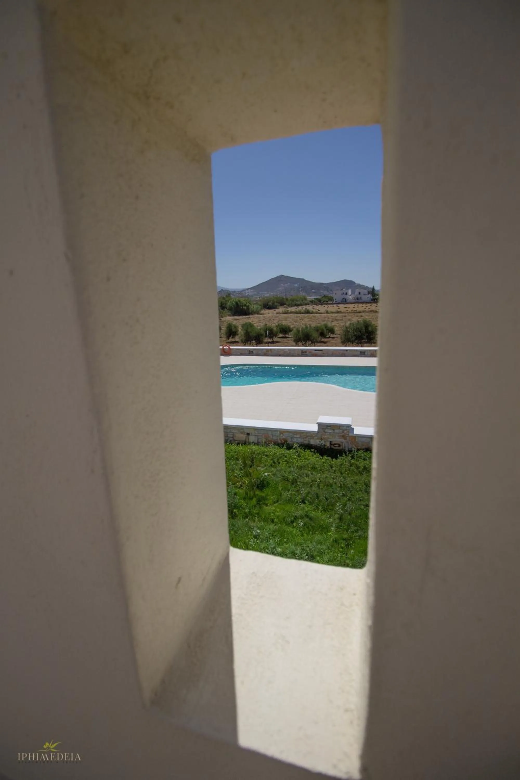 Swimming pool in Iphimedeia Luxury Hotel & Suites