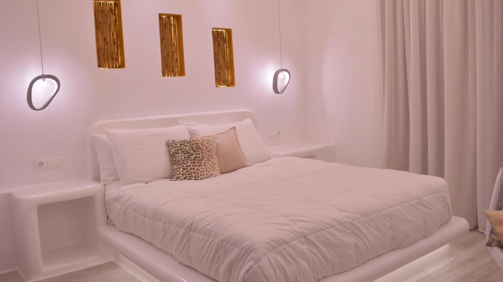 Bed in Iphimedeia Luxury Hotel & Suites