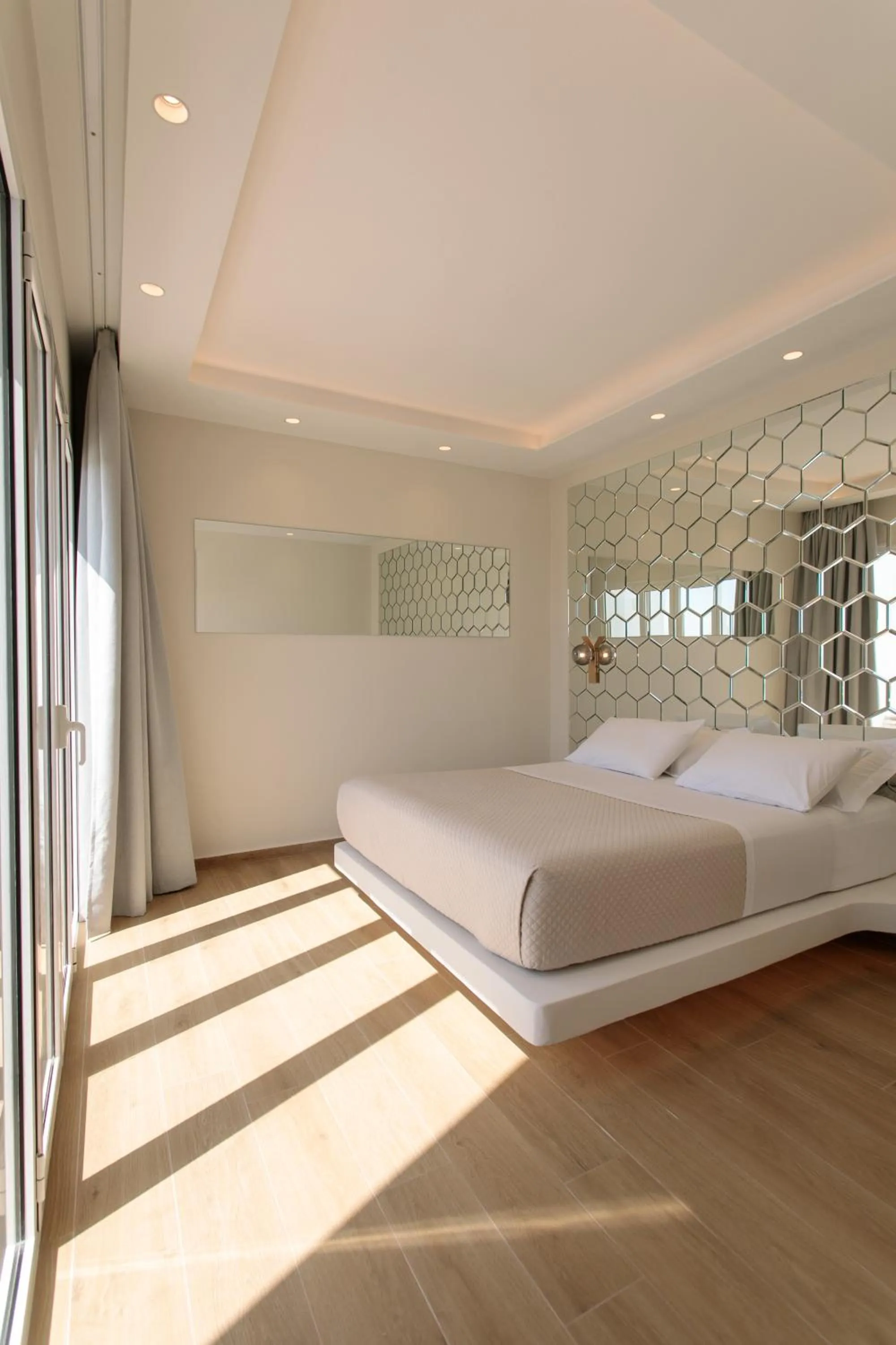 Bed in Iphimedeia Luxury Hotel & Suites