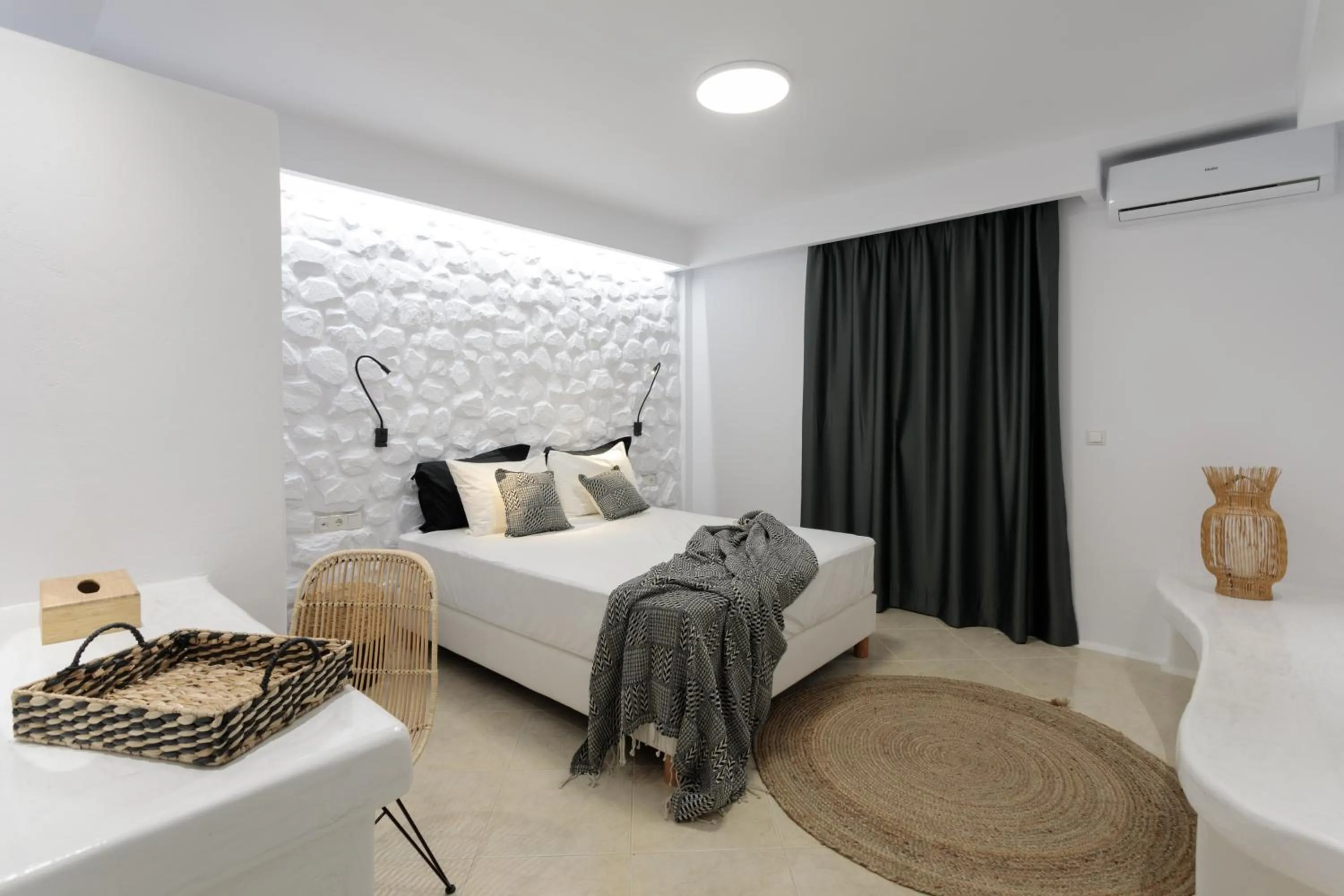 Bed in Iphimedeia Luxury Hotel & Suites