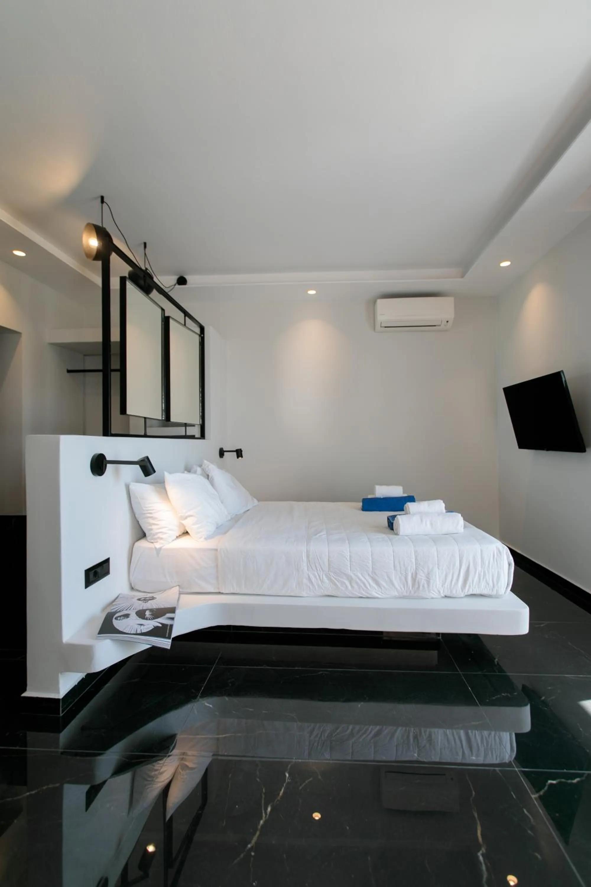 Bed in Iphimedeia Luxury Hotel & Suites