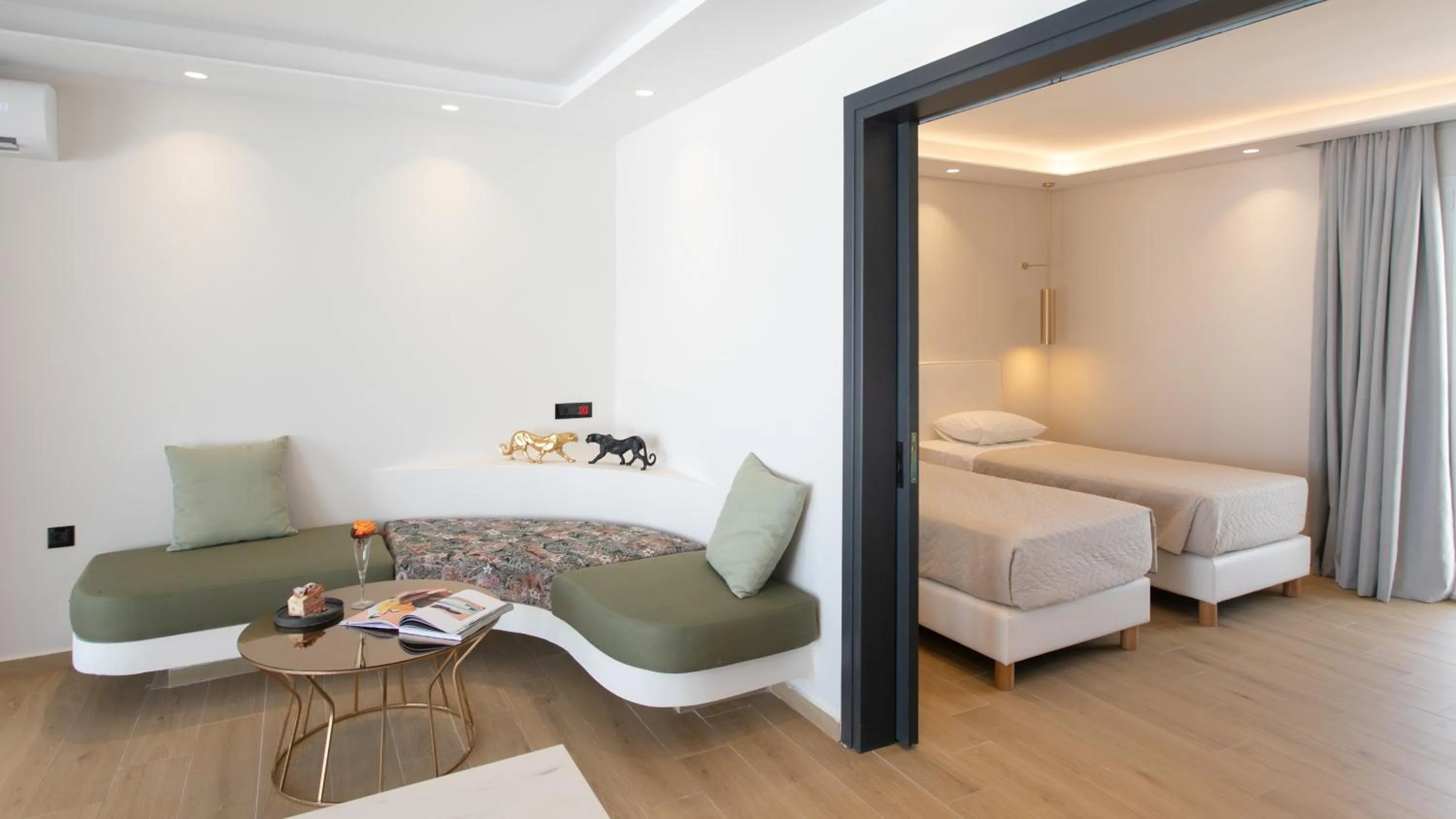 Bed in Iphimedeia Luxury Hotel & Suites