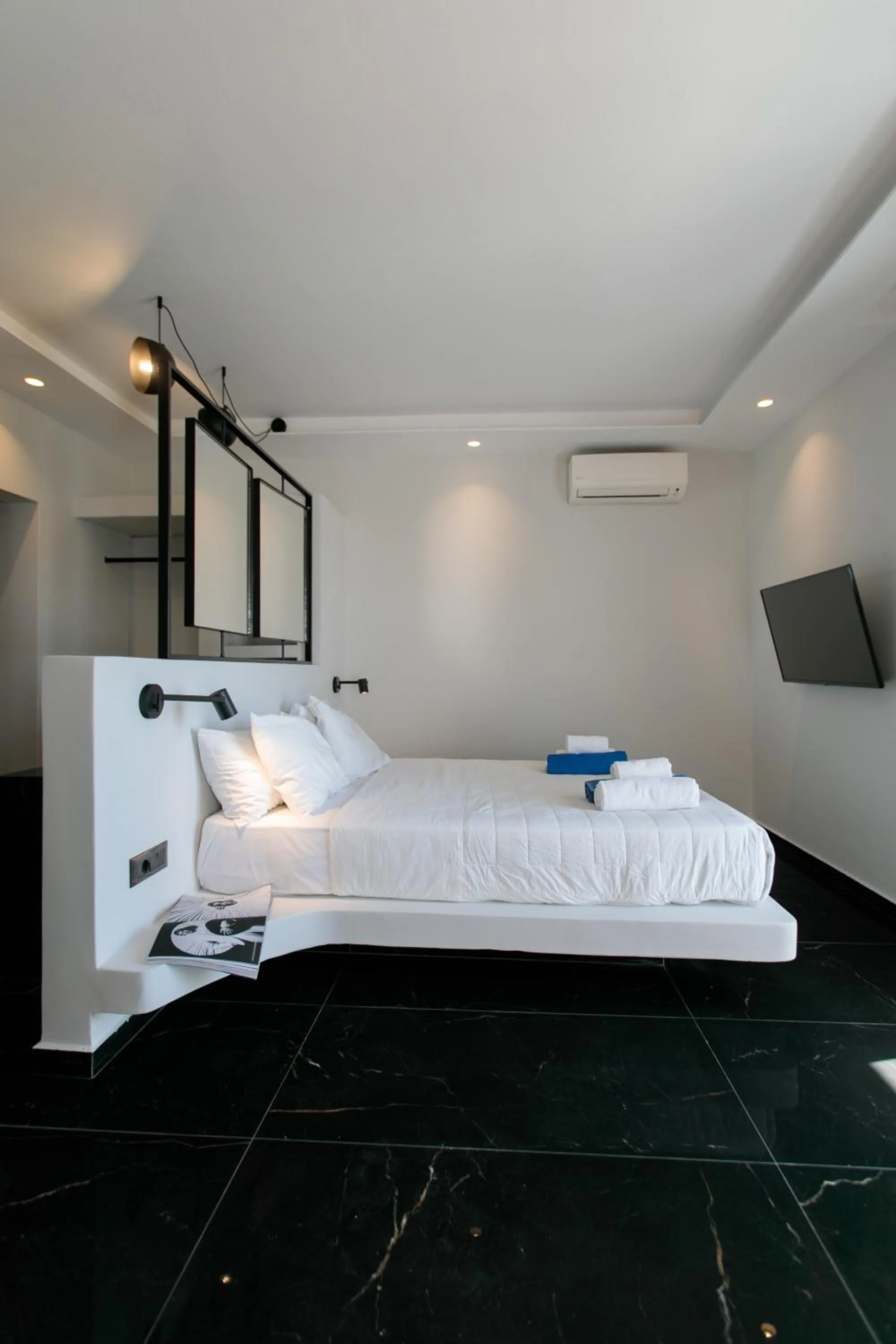 Bed in Iphimedeia Luxury Hotel & Suites