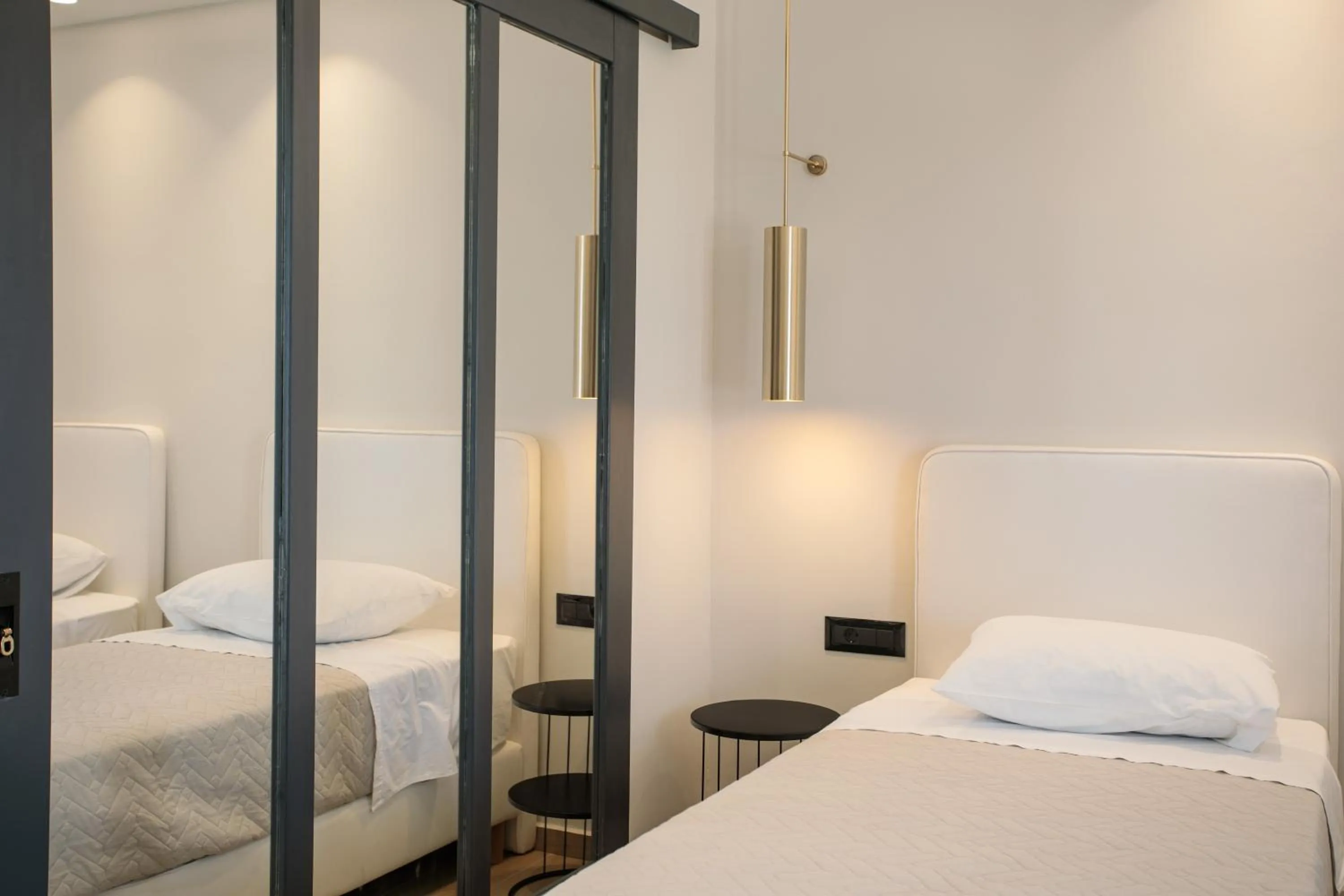 Bed in Iphimedeia Luxury Hotel & Suites