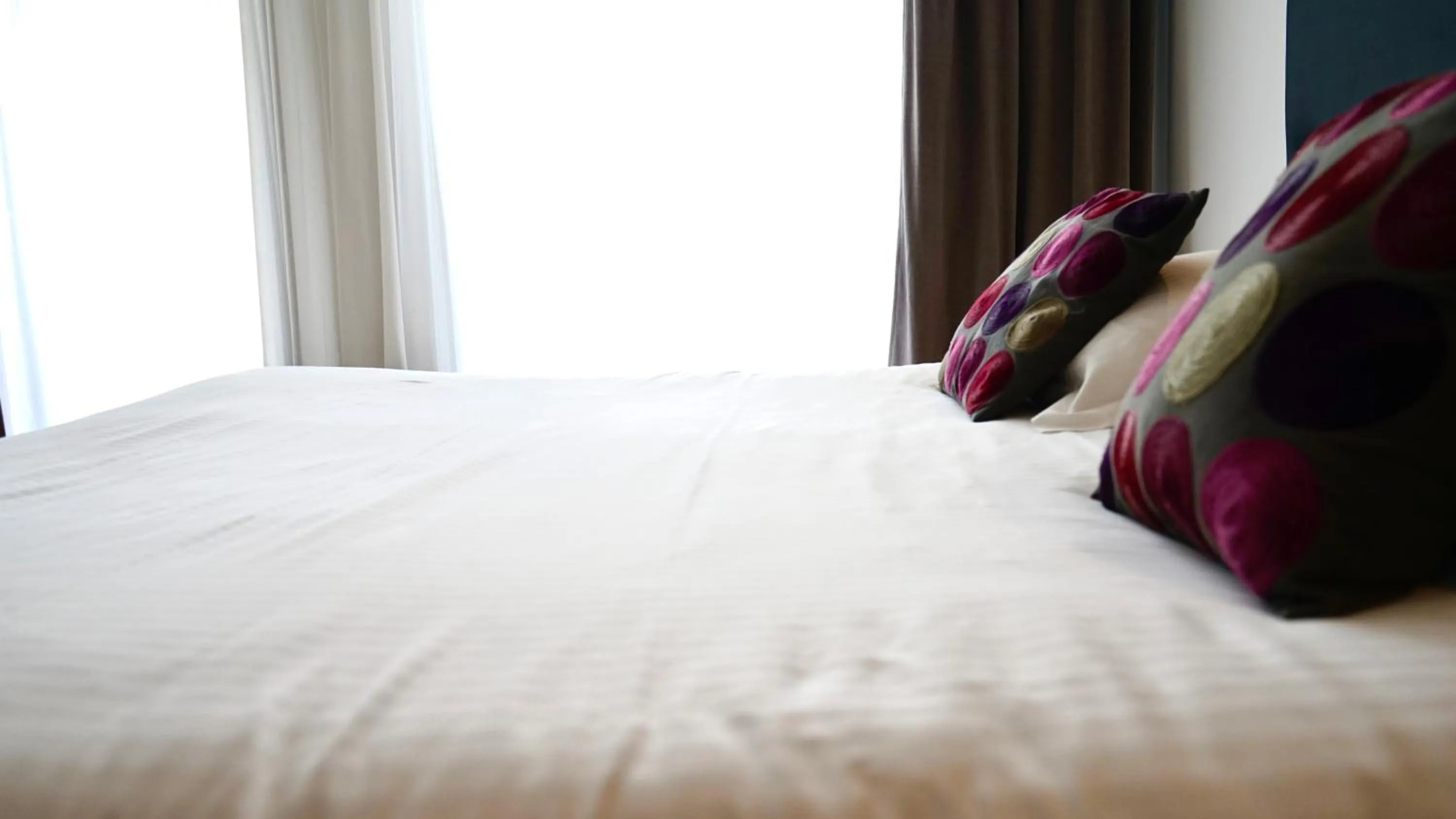 Bed in Logis Hôtel Relais de Vincey