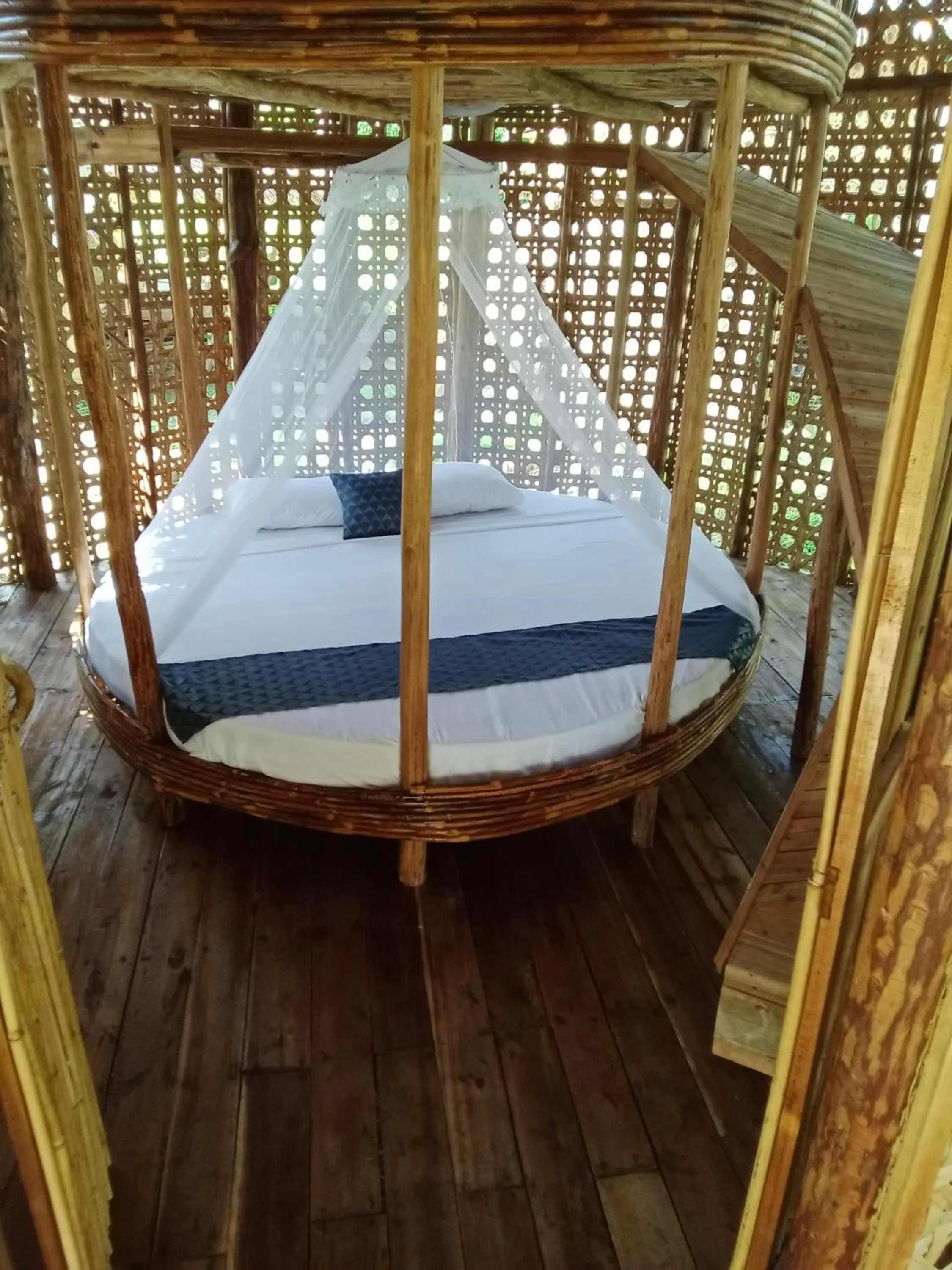 Bed in Prince John Beachfront Eco Bungalows and Restaurant
