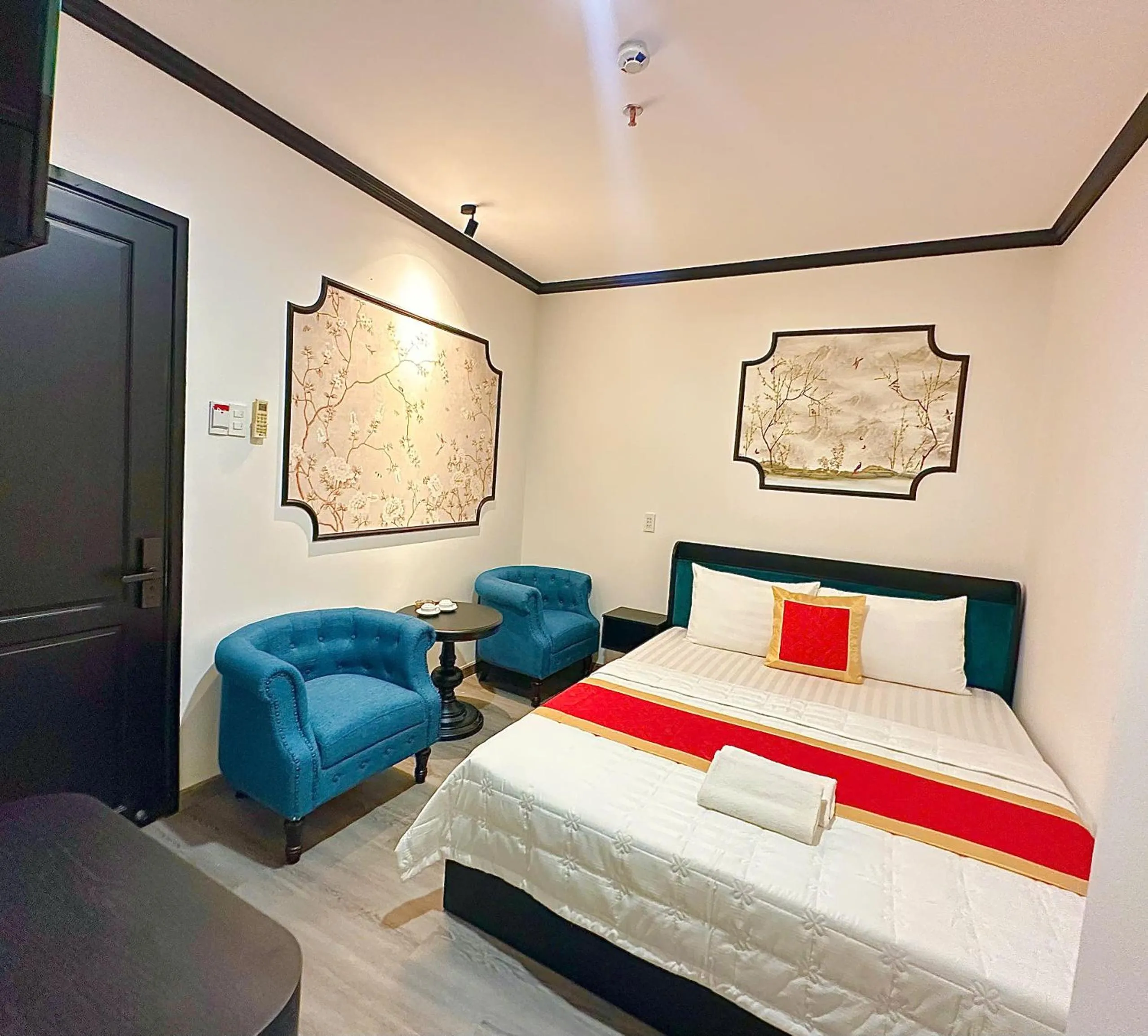 Bed in Phu Gia Hotel 193 Nguyen Thai Hoc