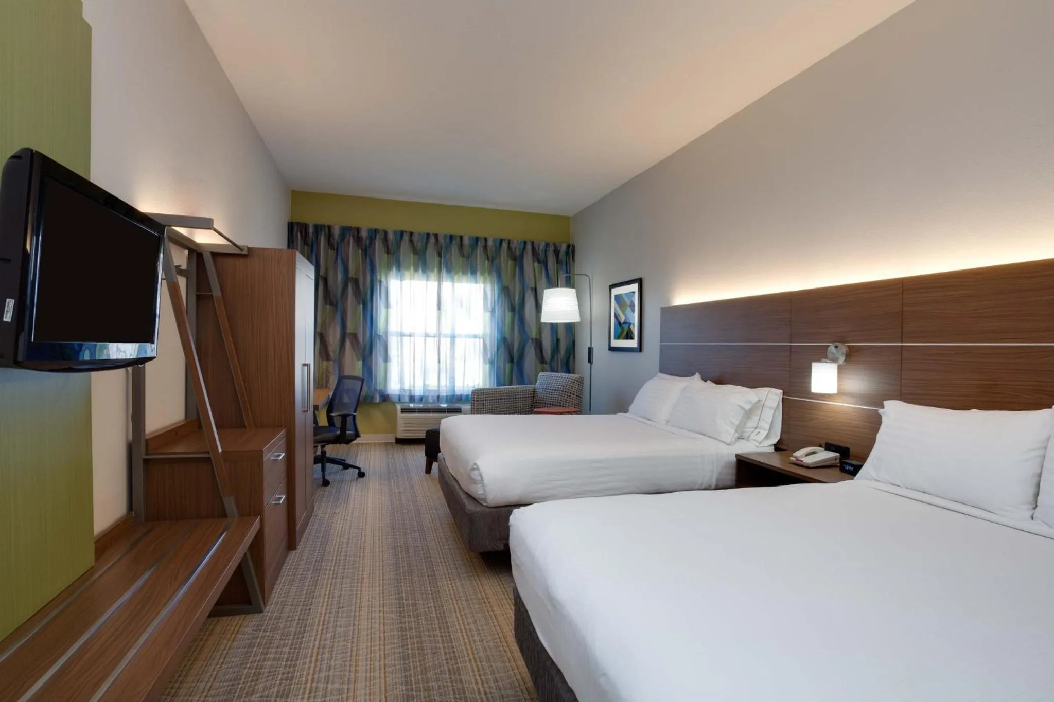 Photo of the whole room, Bed in Holiday Inn Express & Suites Orlando International Airport by IHG