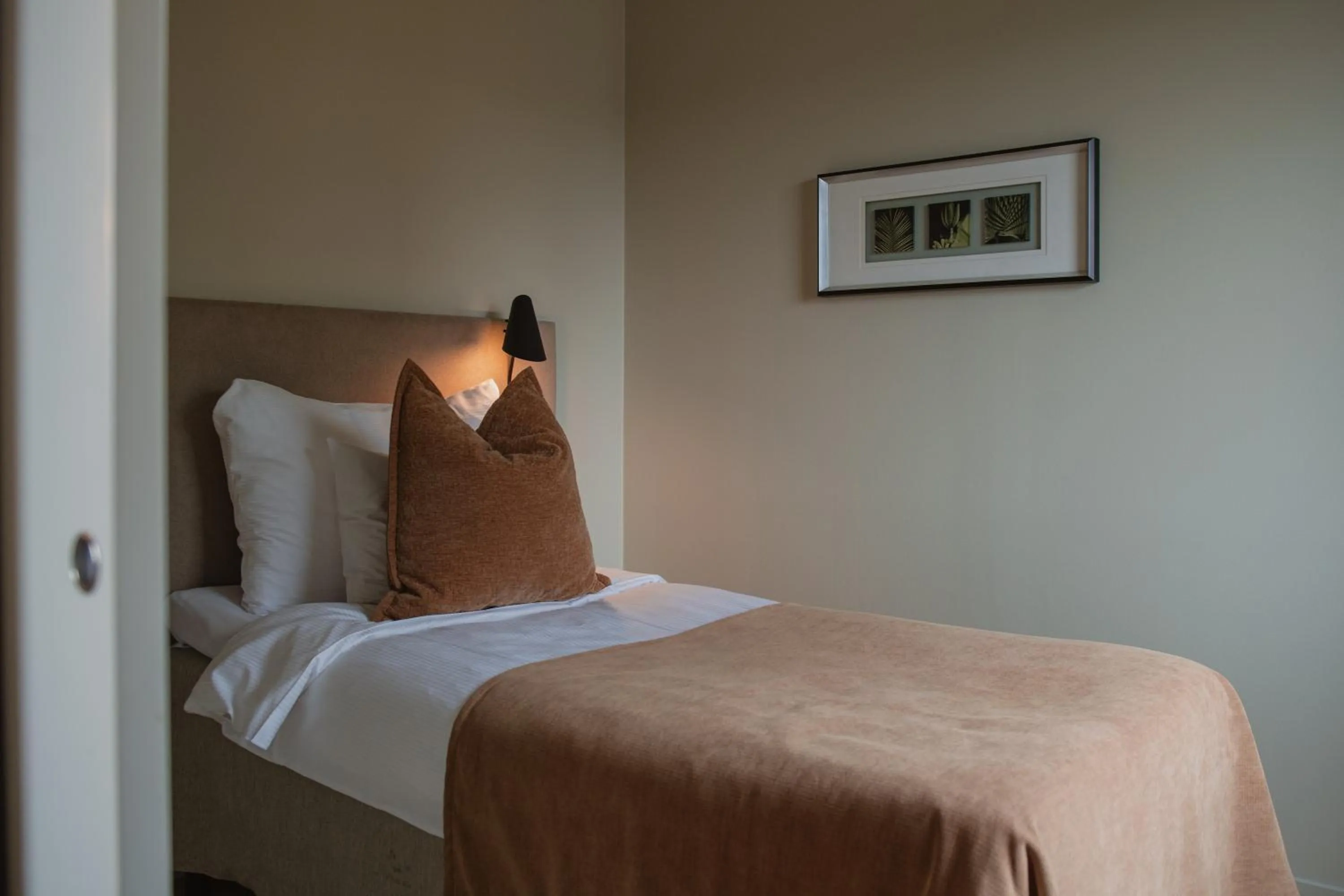 Bed in Home Hotel Odin
