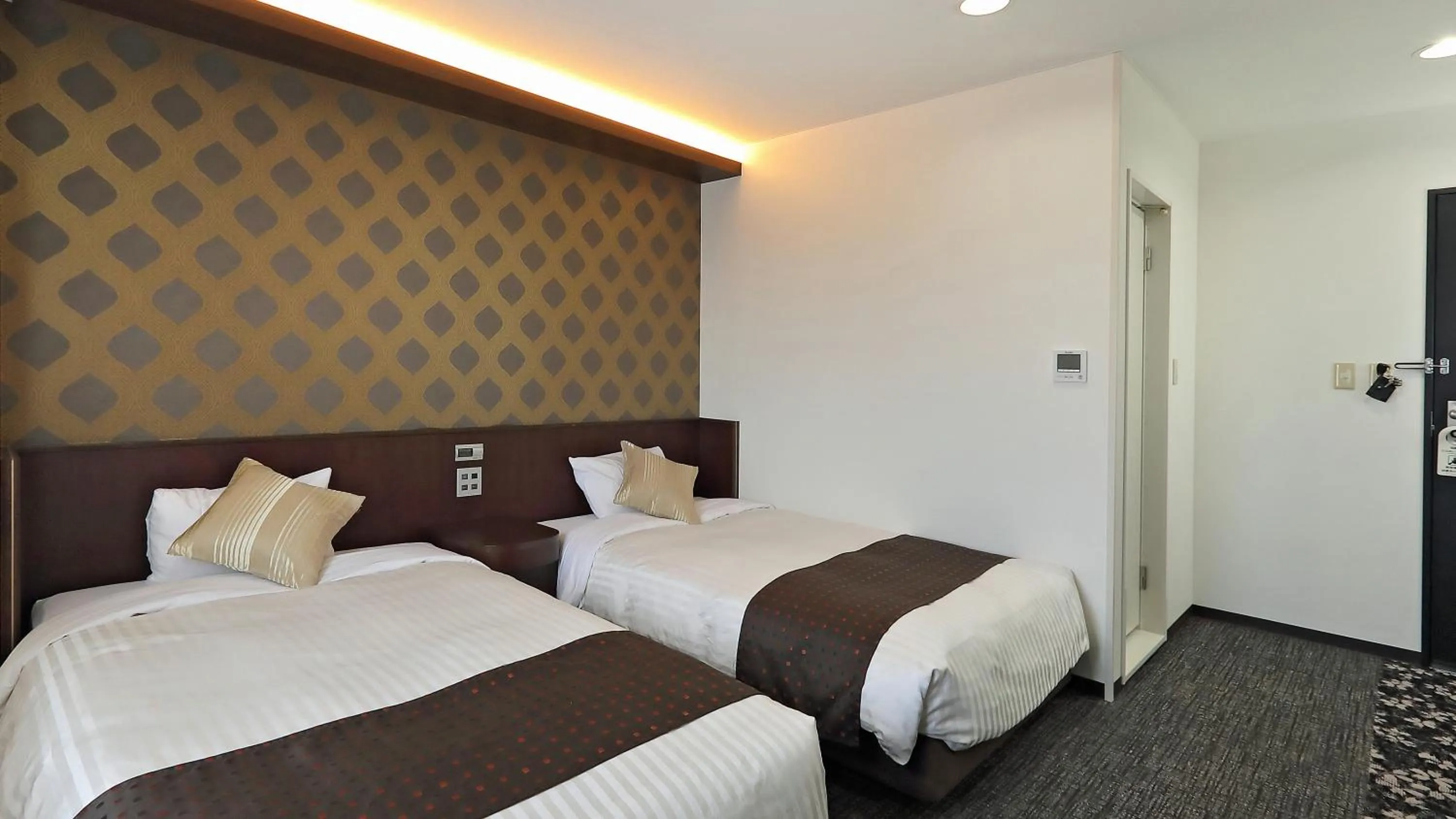 Bed in Hotel Annex Inn