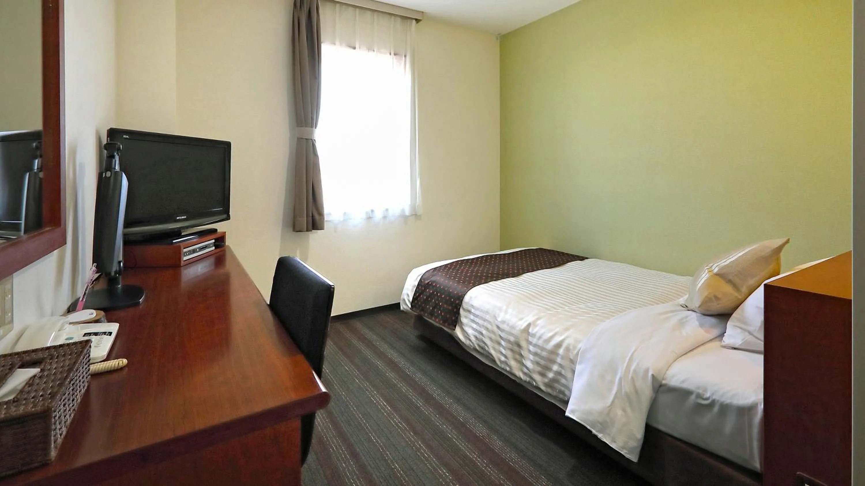 Bed in Hotel Annex Inn