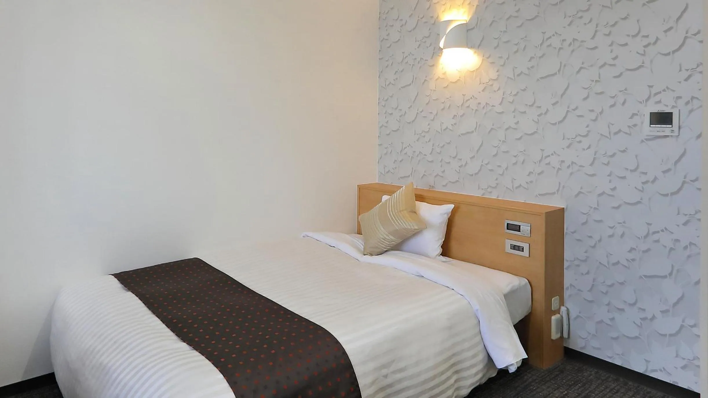 Bed in Hotel Annex Inn