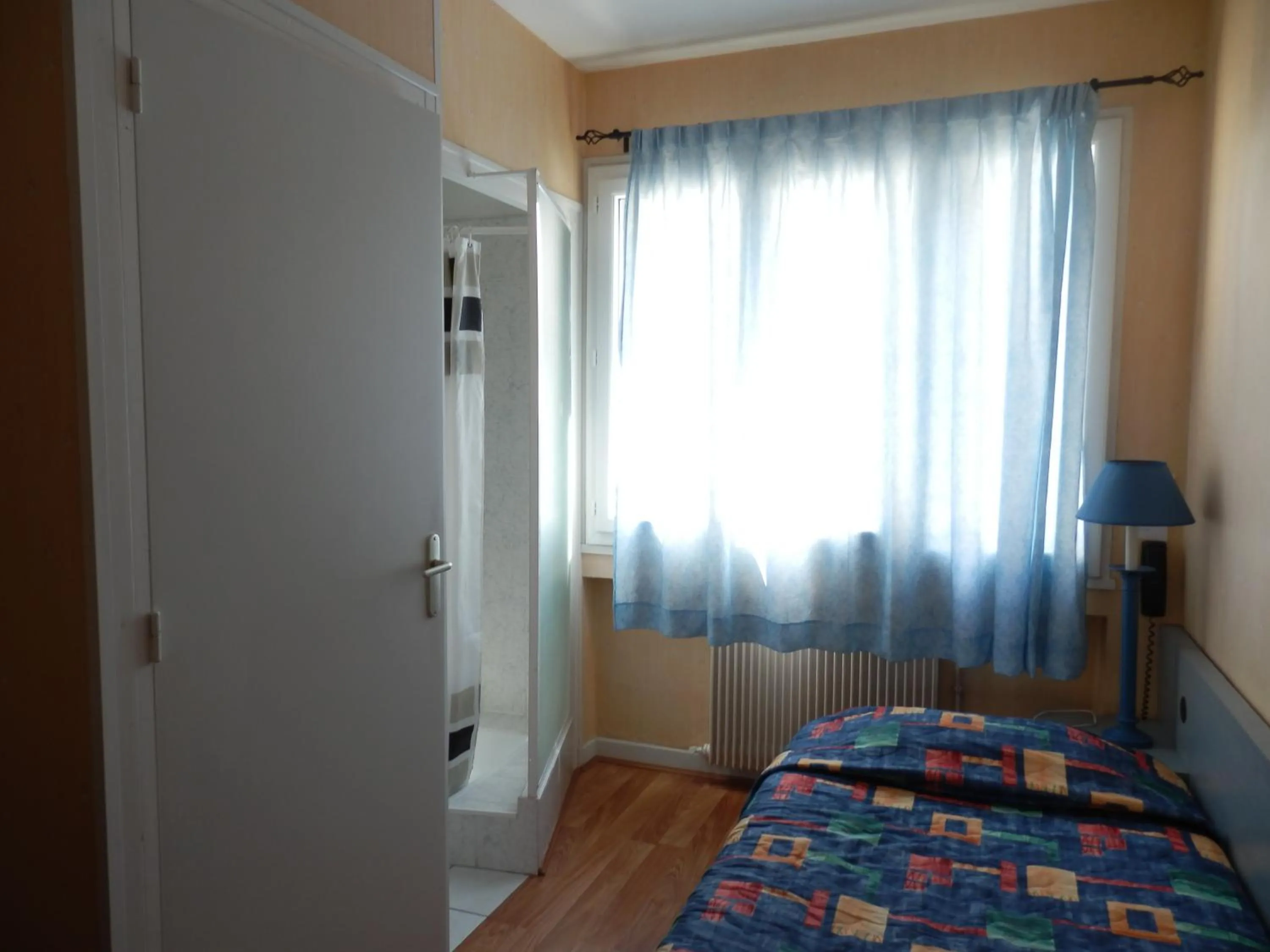 Bed in Hotel Val De Saone Lyon Caluire Rillieux