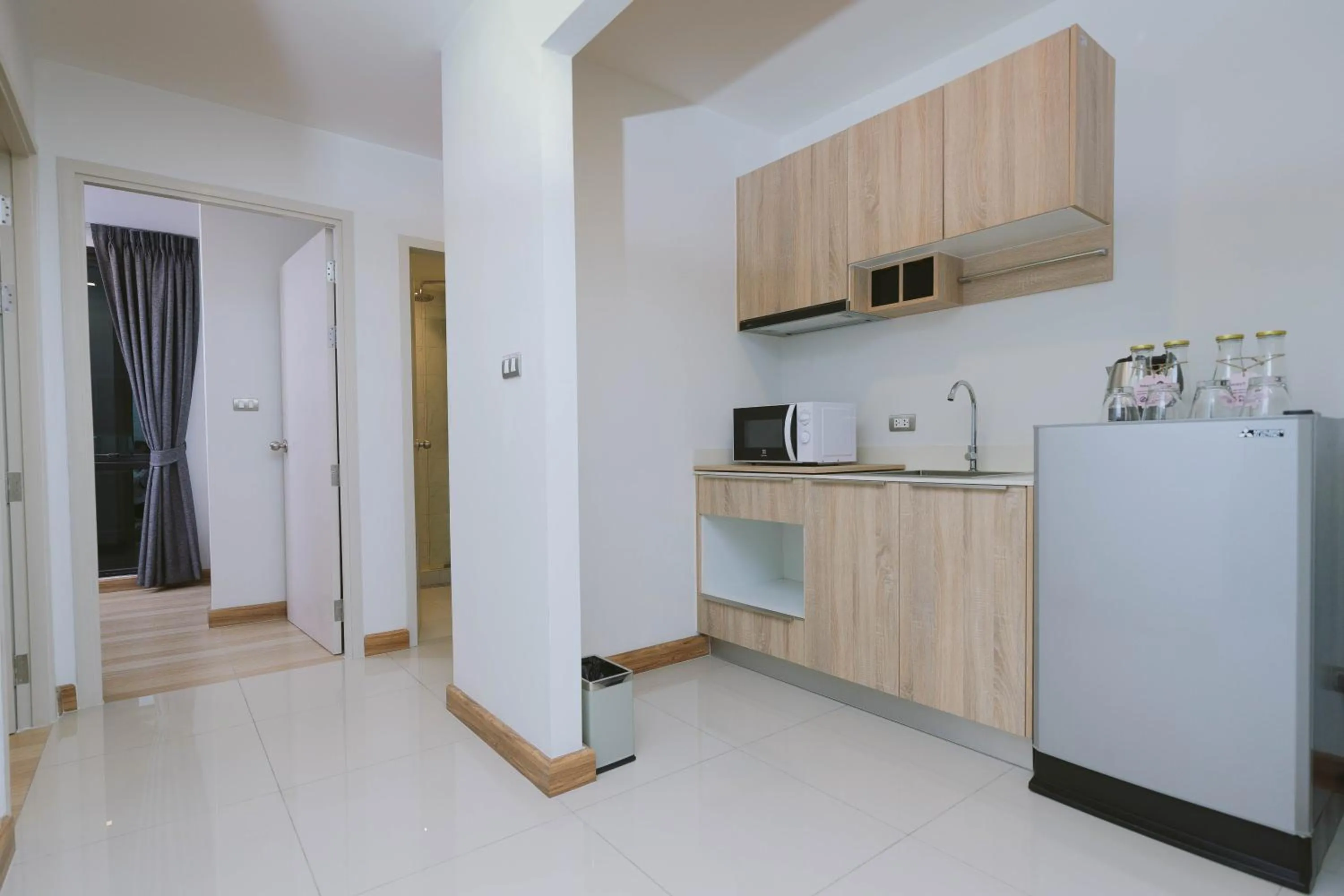 Kitchen or kitchenette in Kokotel Bangkok Sukhumvit 50