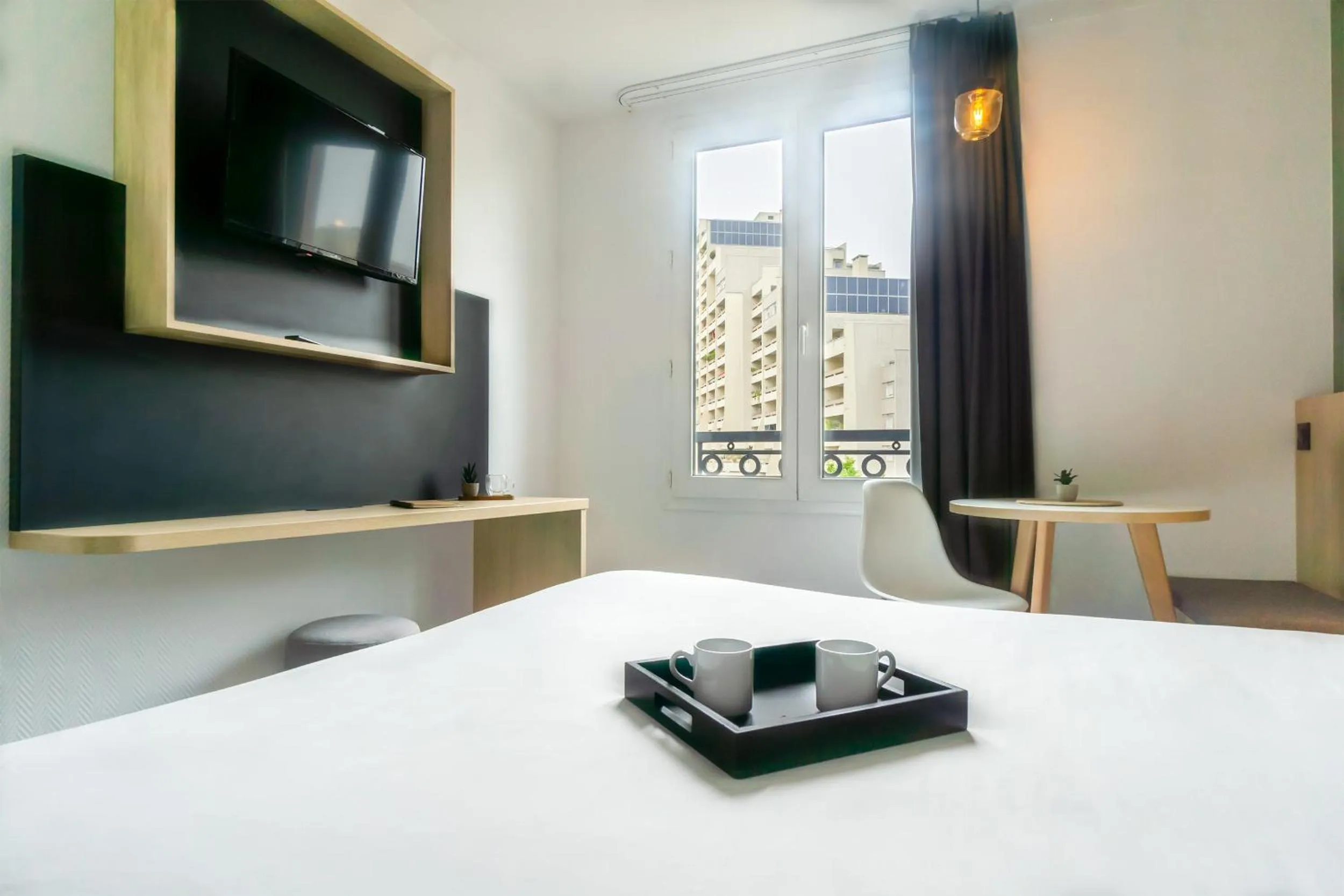 TV and multimedia, Bed in City Résidence Paris Saint-Maurice