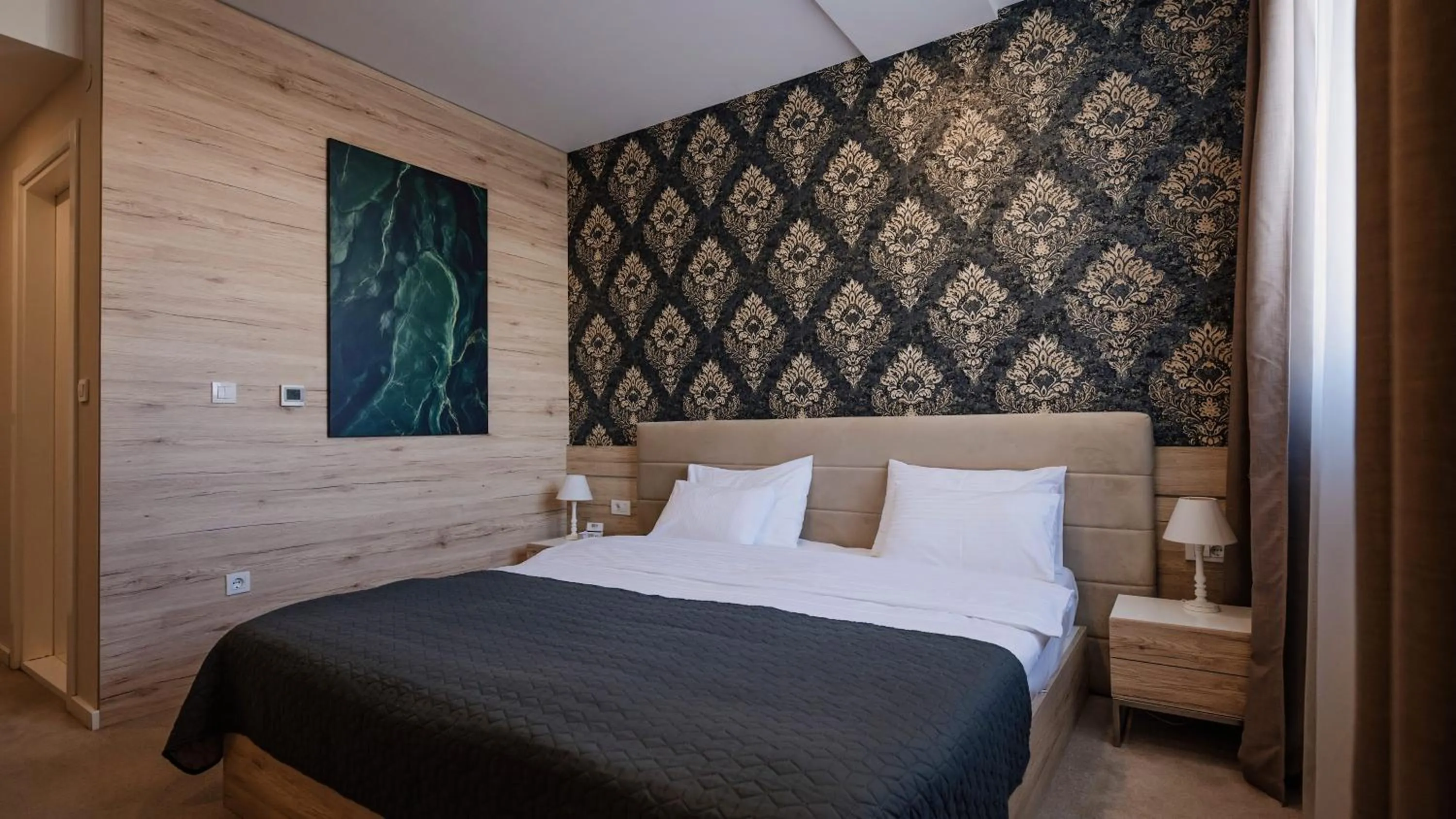 Photo of the whole room, Bed in IG Hotel