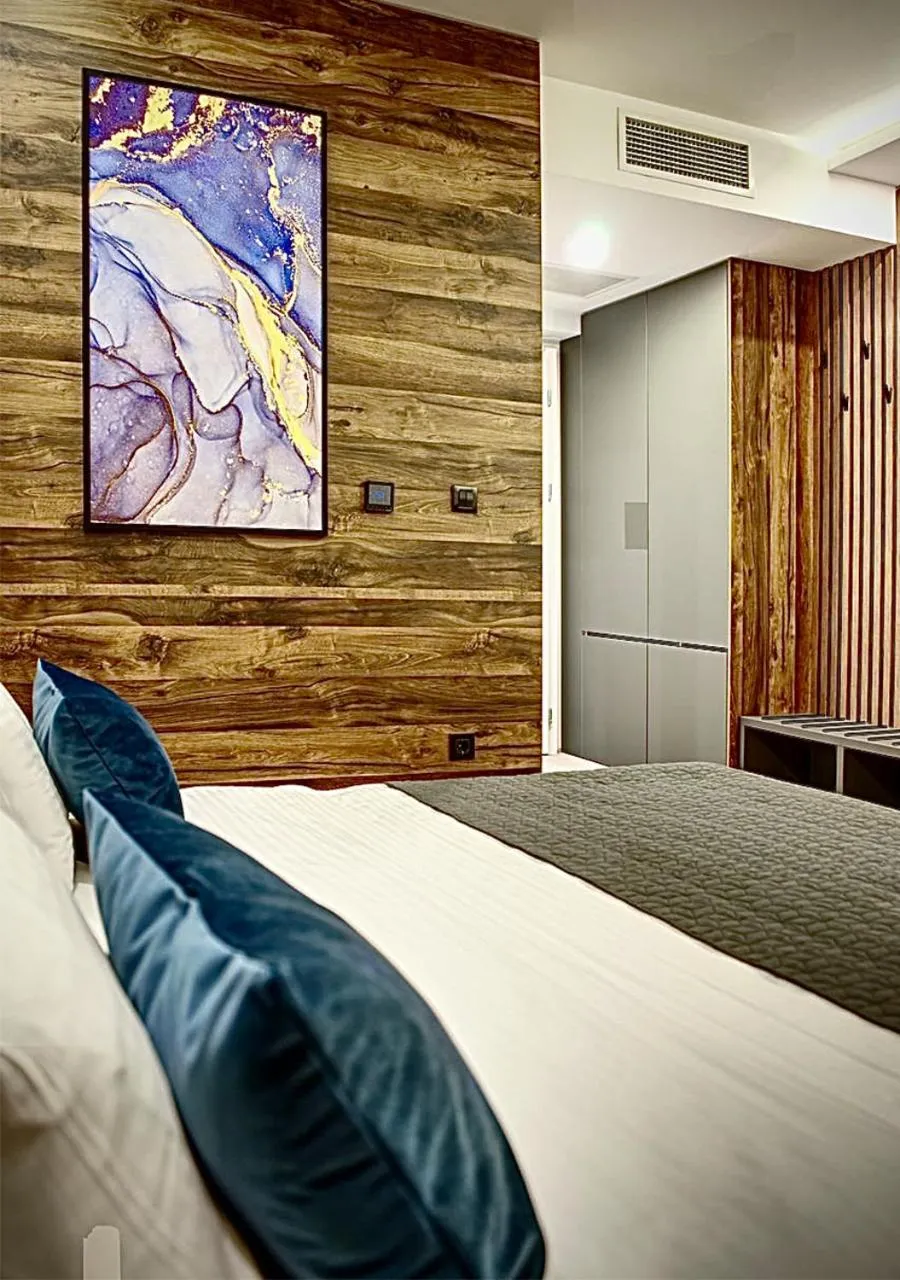 Photo of the whole room, Bed in IG Hotel