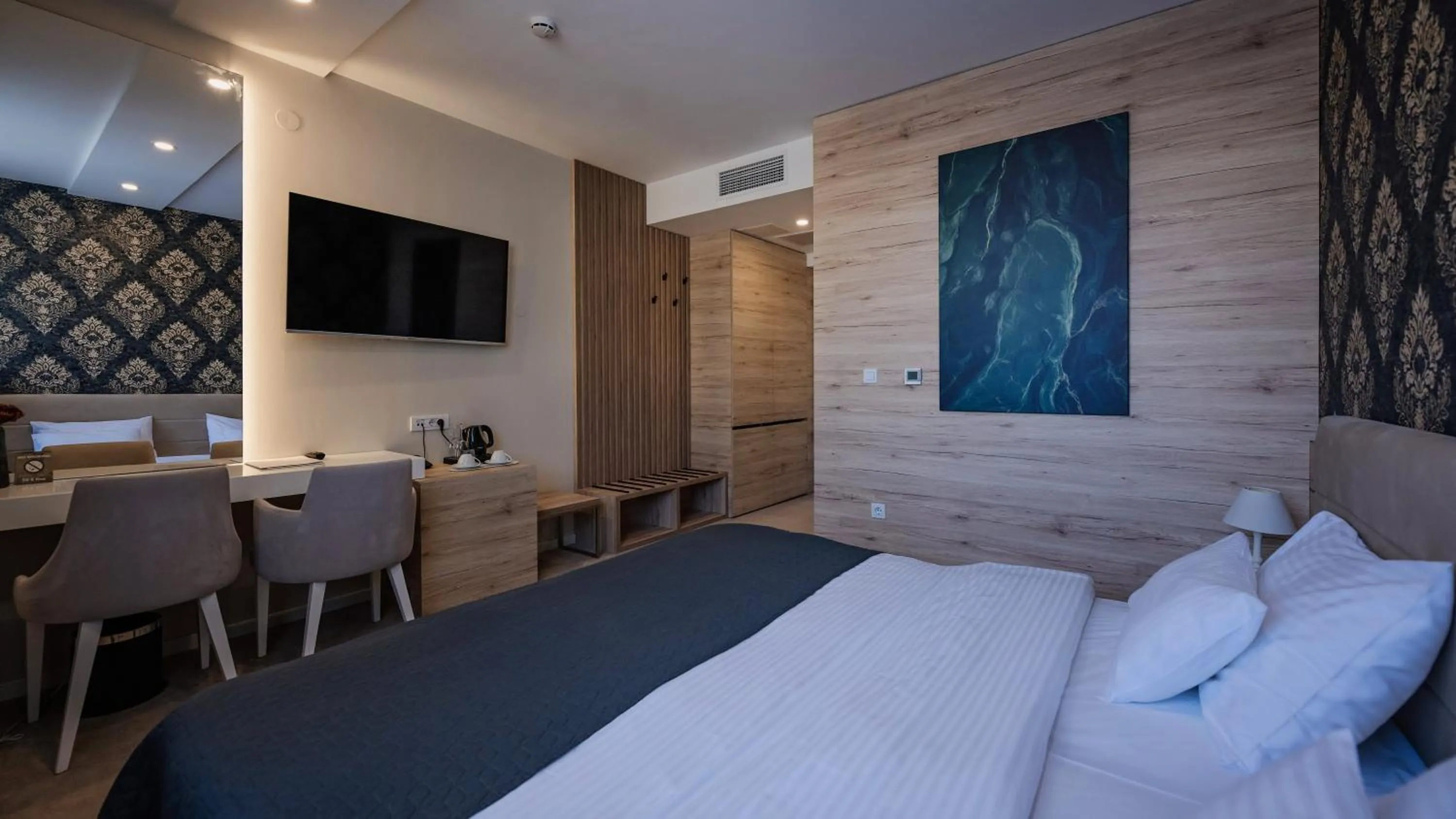 Photo of the whole room, Bed in IG Hotel