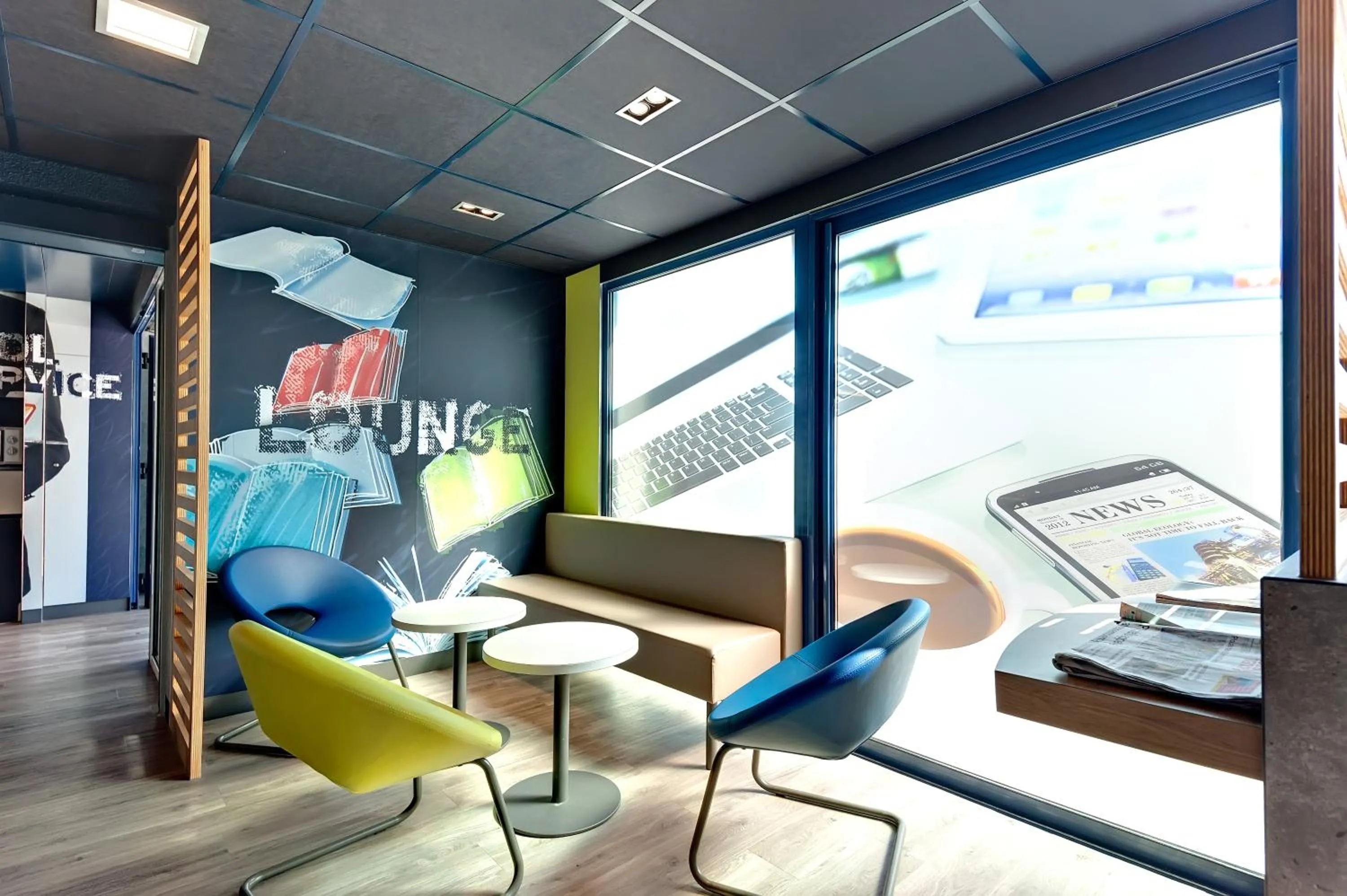 Communal lounge/ TV room in ibis budget La Roche Sur Yon Vendespace