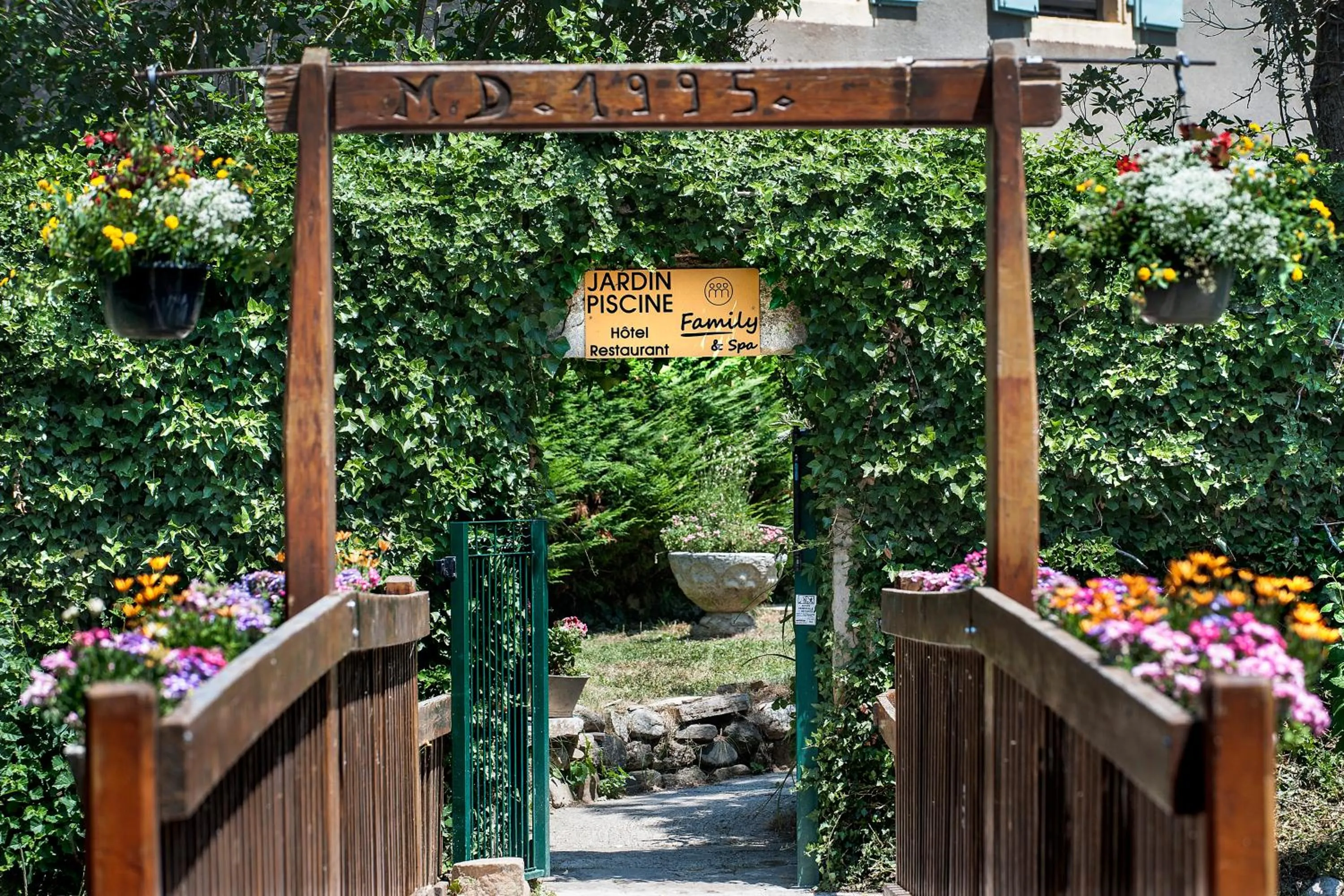 Garden in Logis Hotel Restaurant Family & Spa