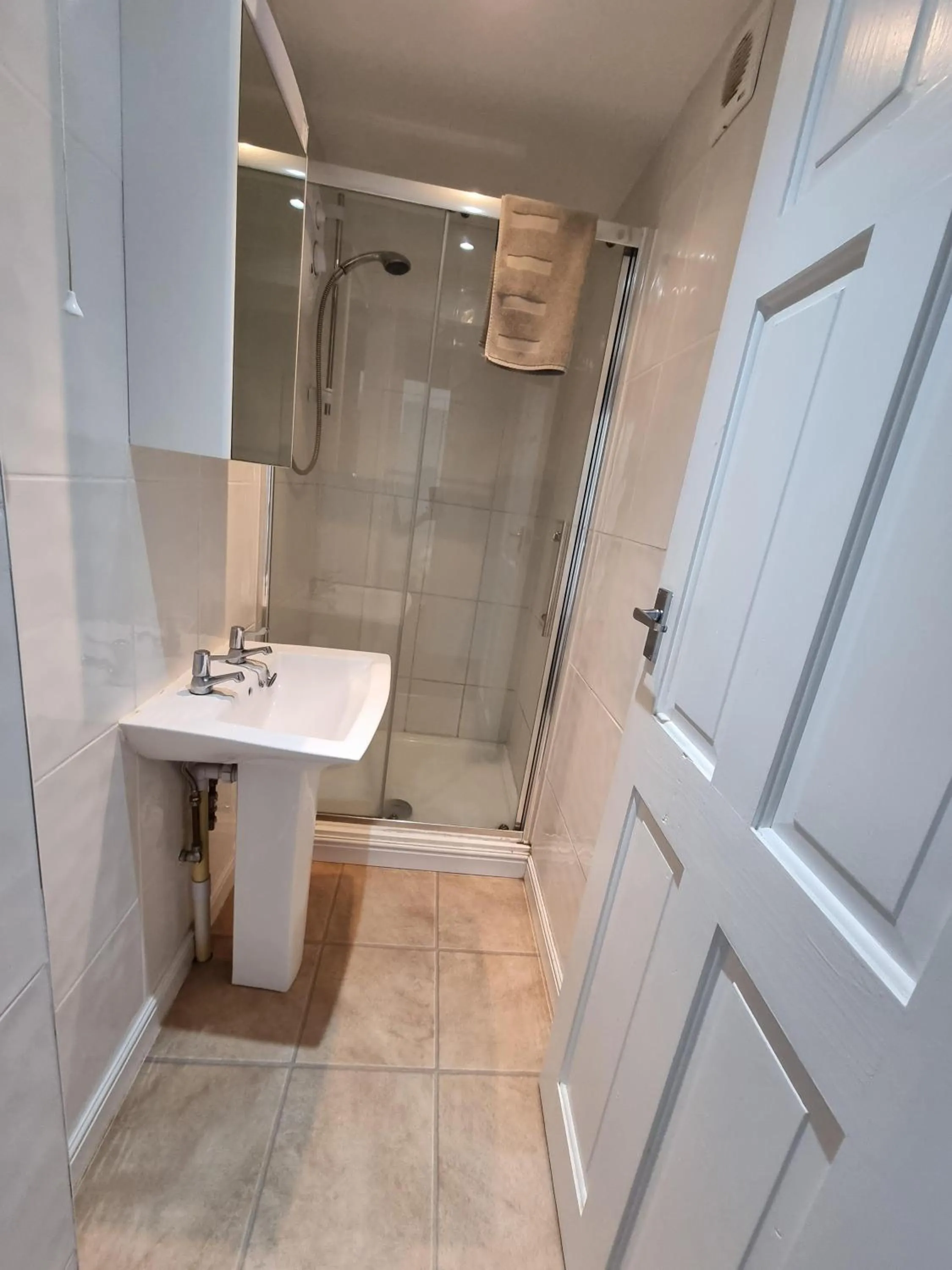 Bathroom in Beachcomber Holiday Apartments