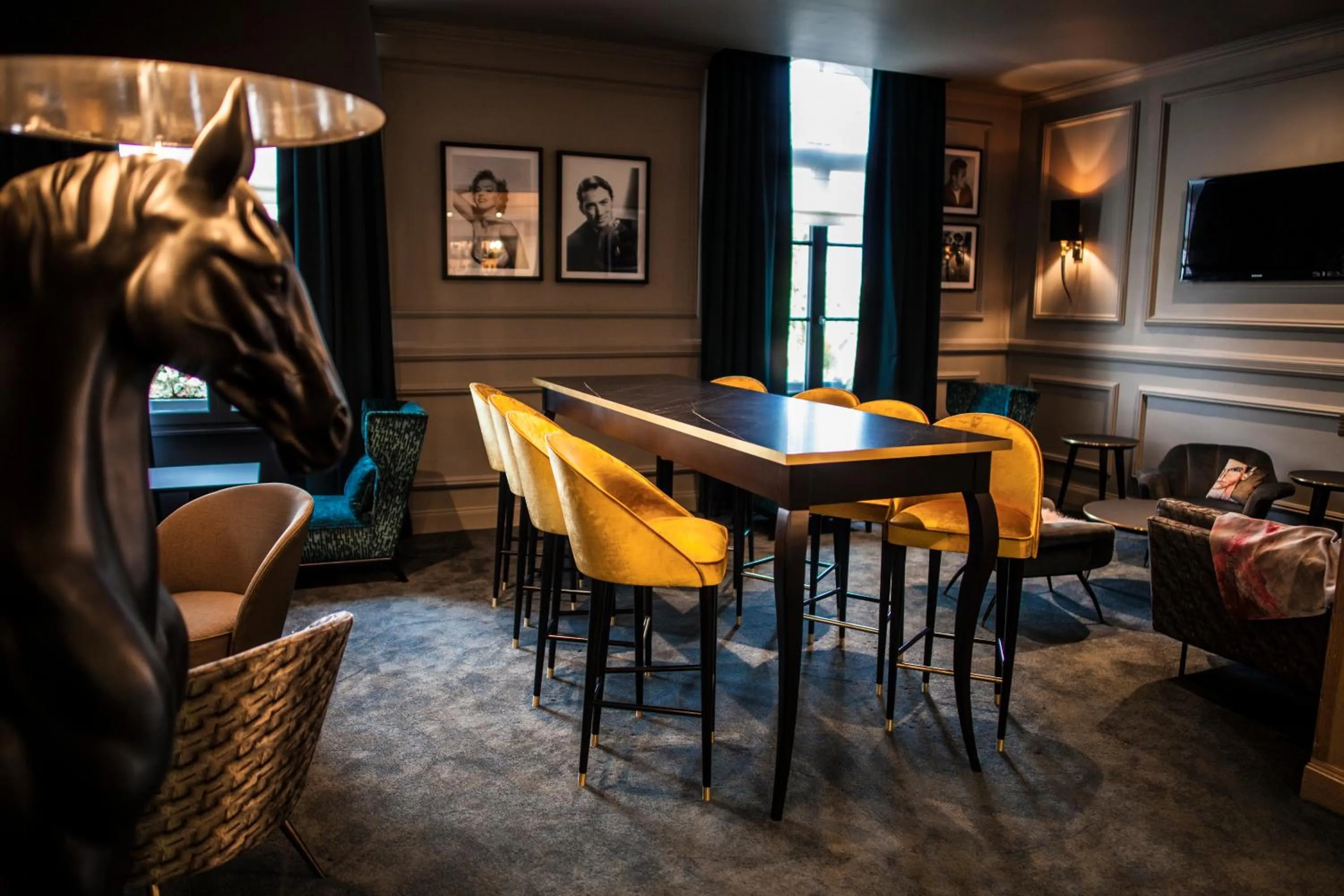 Communal lounge/ TV room in The Originals Boutique, La Maison Rouge, Lens Ouest