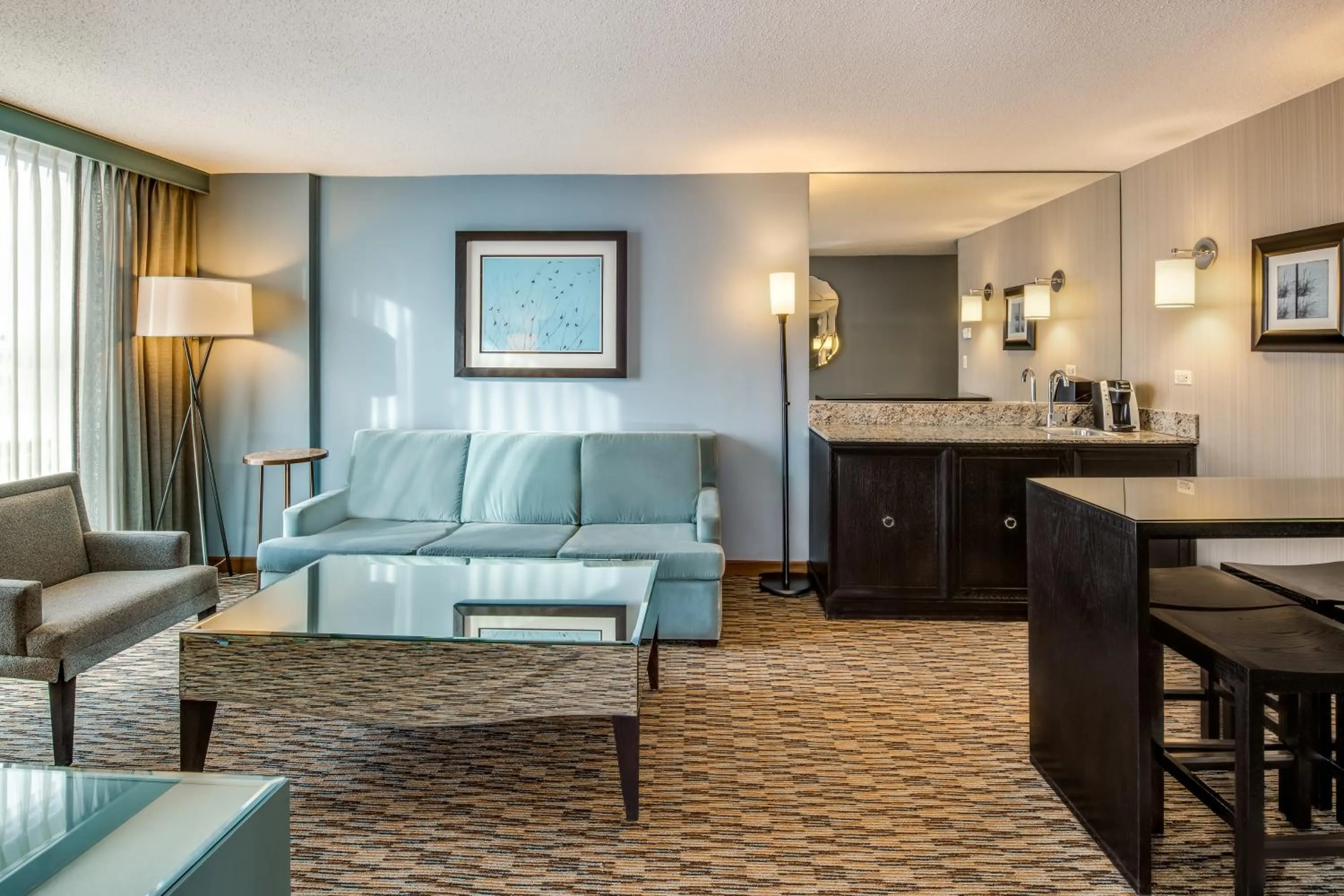 Seating area in Crowne Plaza Chicago O'Hare Hotel & Conference Center by IHG