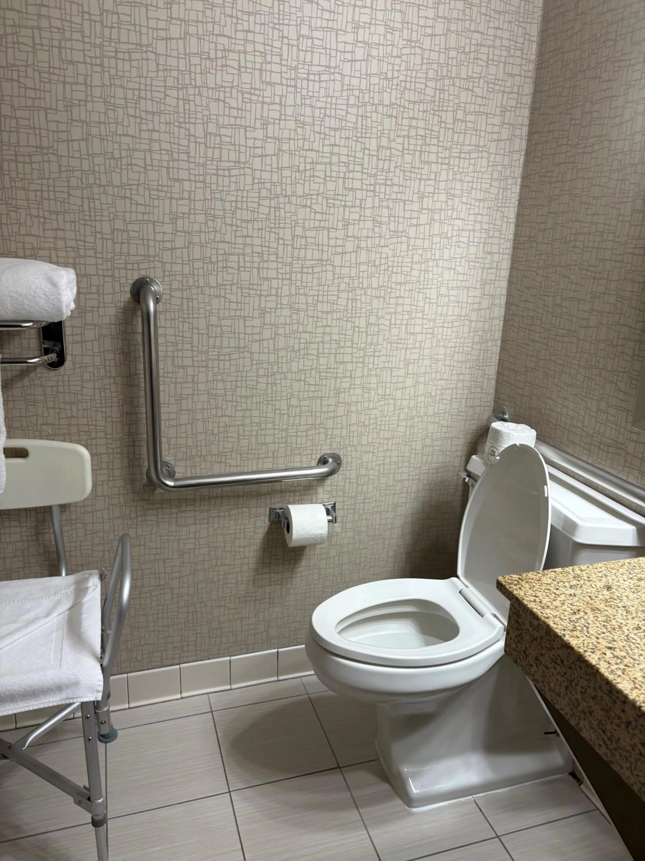 Bathroom in Days Hotel by Wyndham University Ave SE