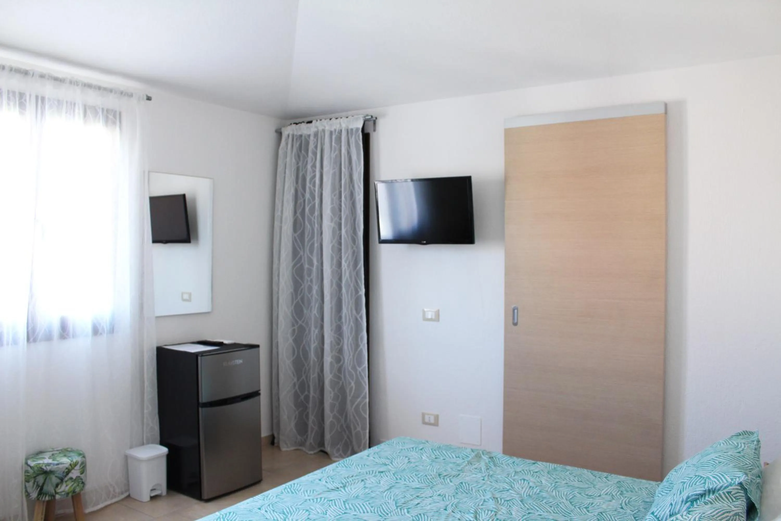 Bed in Acquachiara Rooms