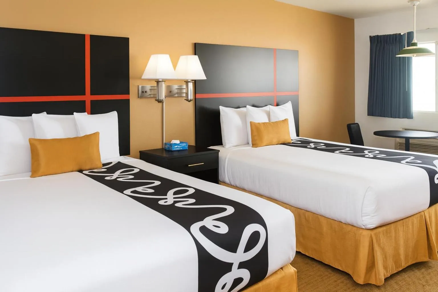 Bed in Chaparral Motor Inn