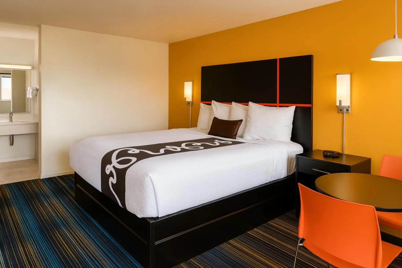 Bed in Chaparral Motor Inn