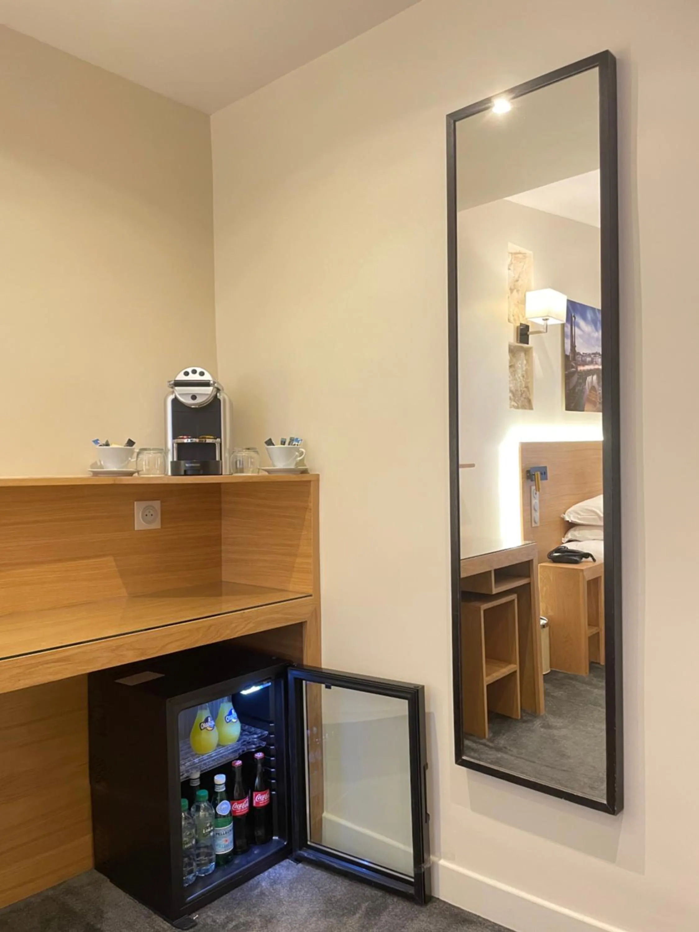 Bedroom in Lion d'Or Paris Hotel