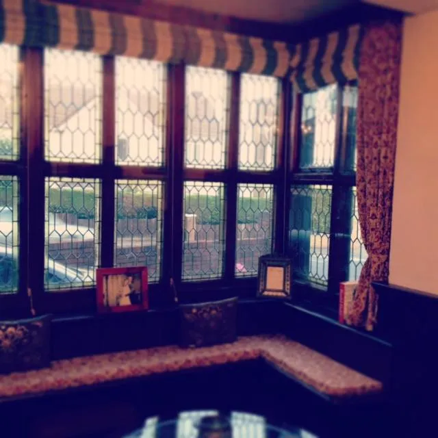 Communal lounge/ TV room in Ty Mynydd Lodge