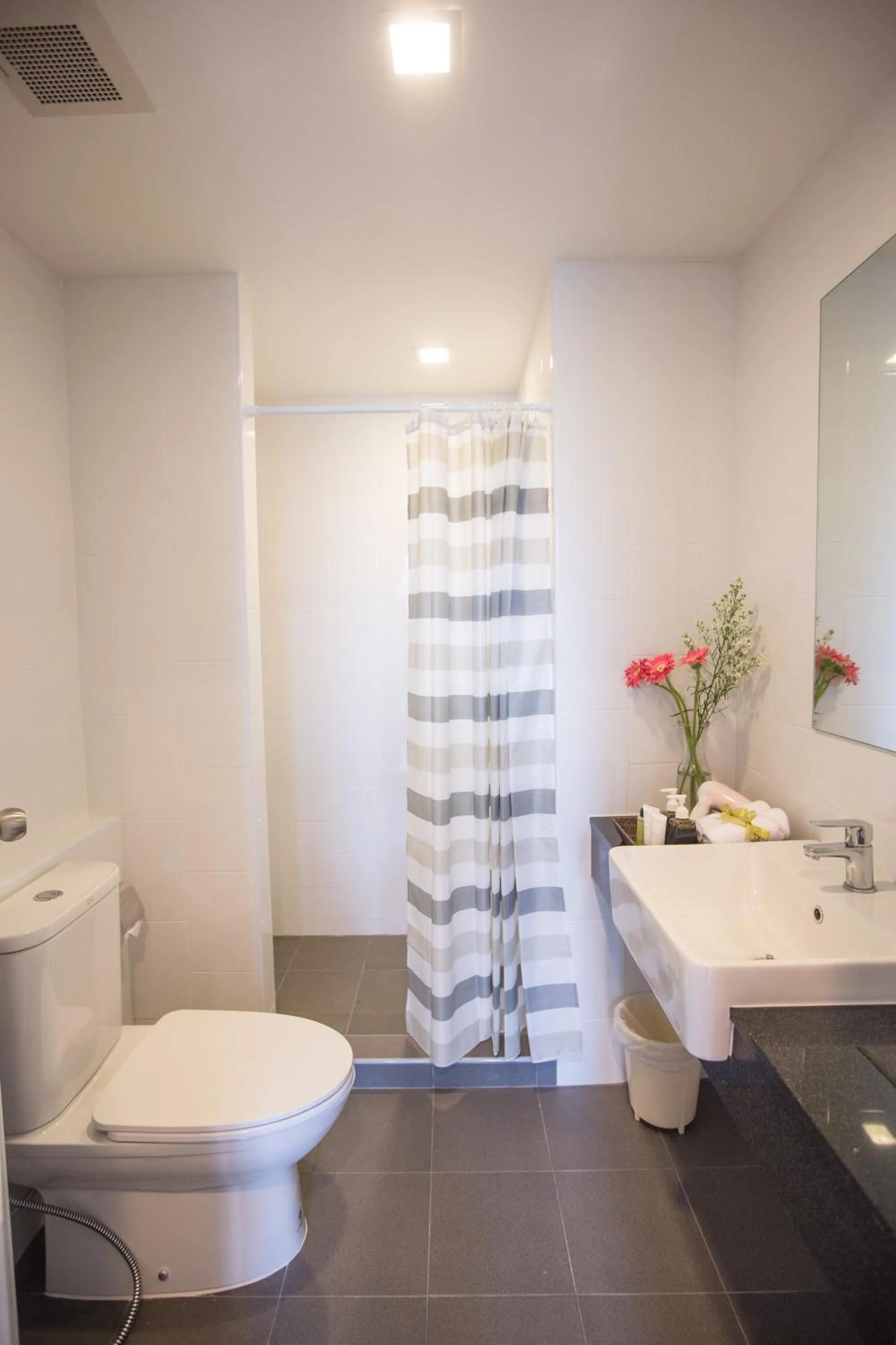 Bathroom in Connext Residence Phuket