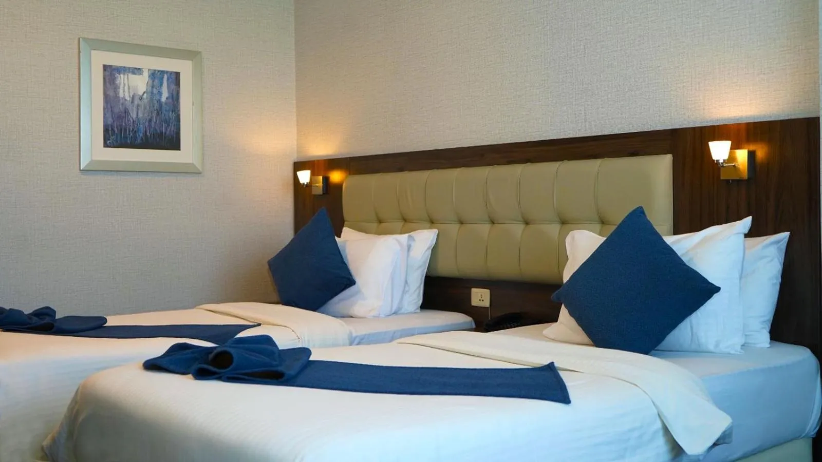 Bed in MENA Tyche Hotel Amman