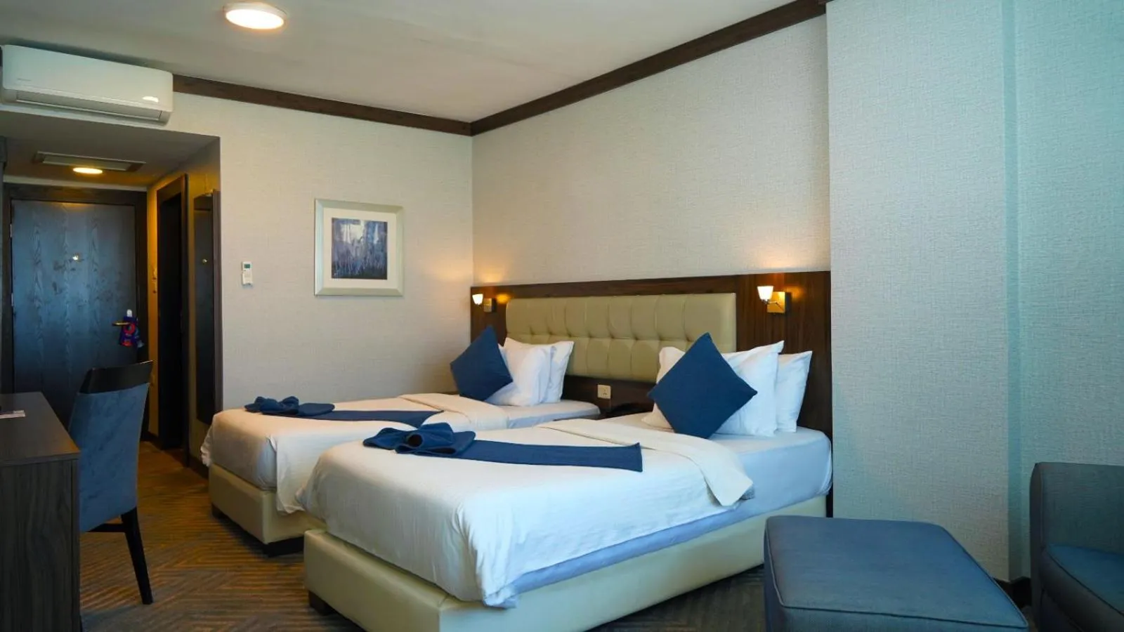 Bed in MENA Tyche Hotel Amman