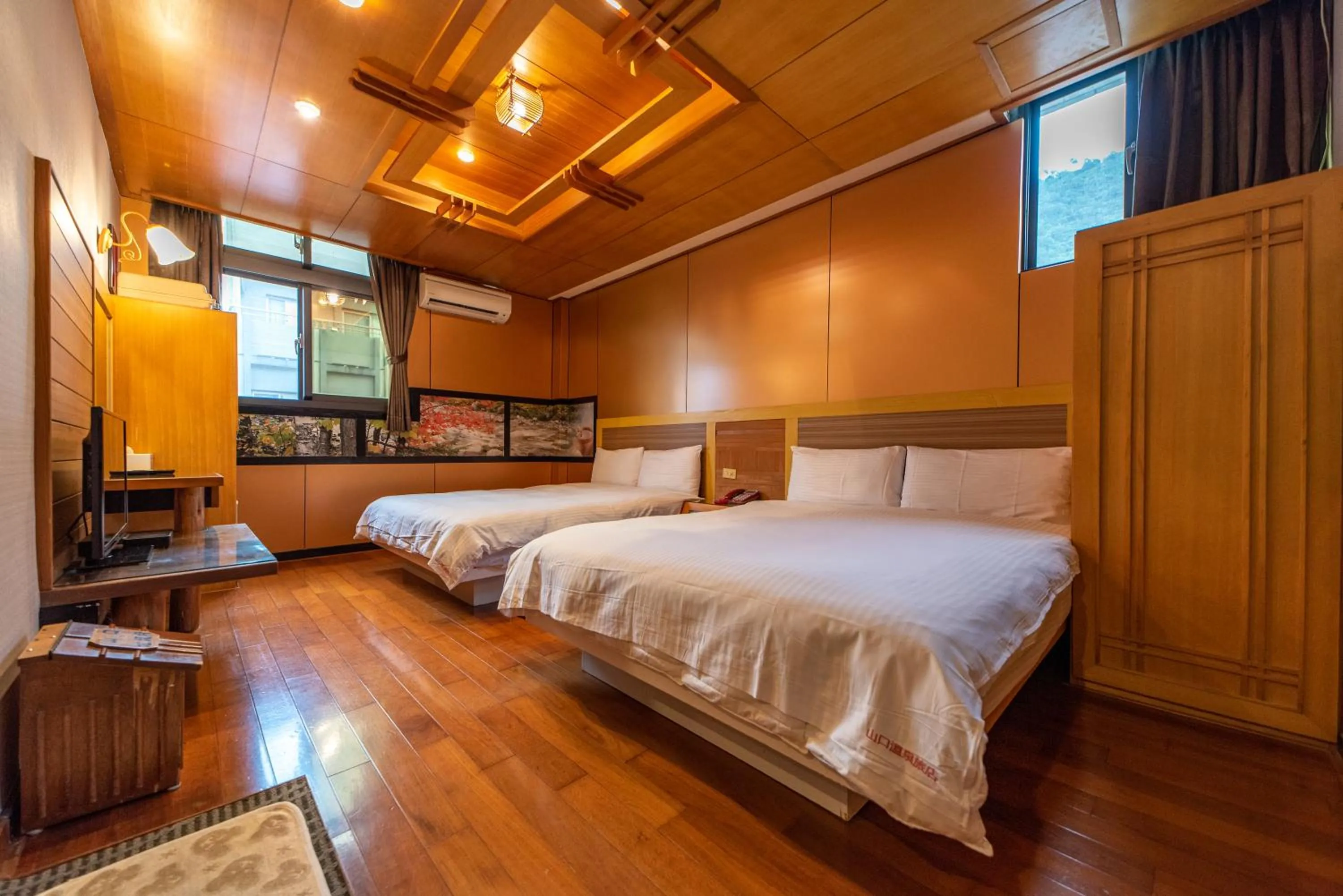 Photo of the whole room, Bed in Shankou Hotspring Hotel