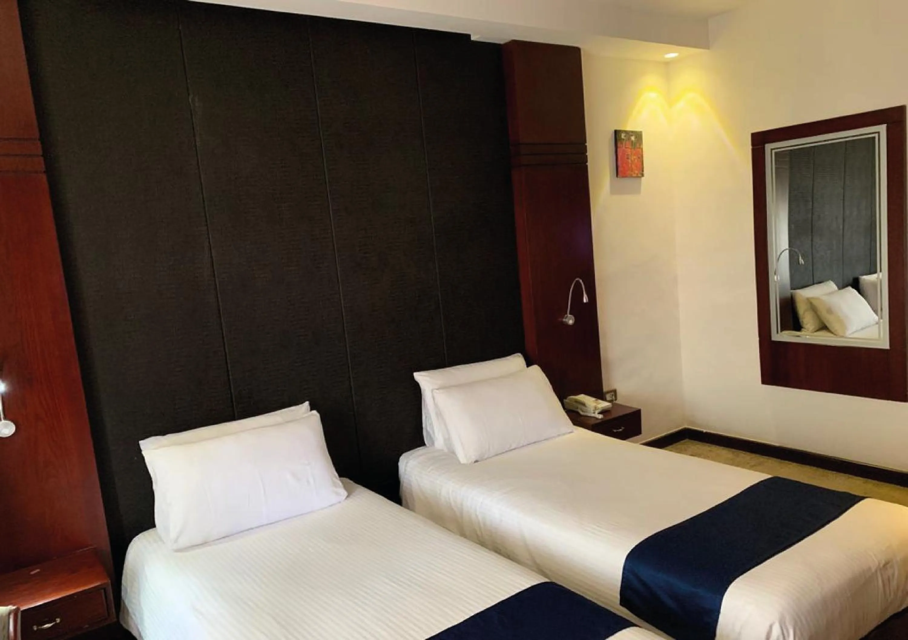 Bed in Torino Hotel Amman