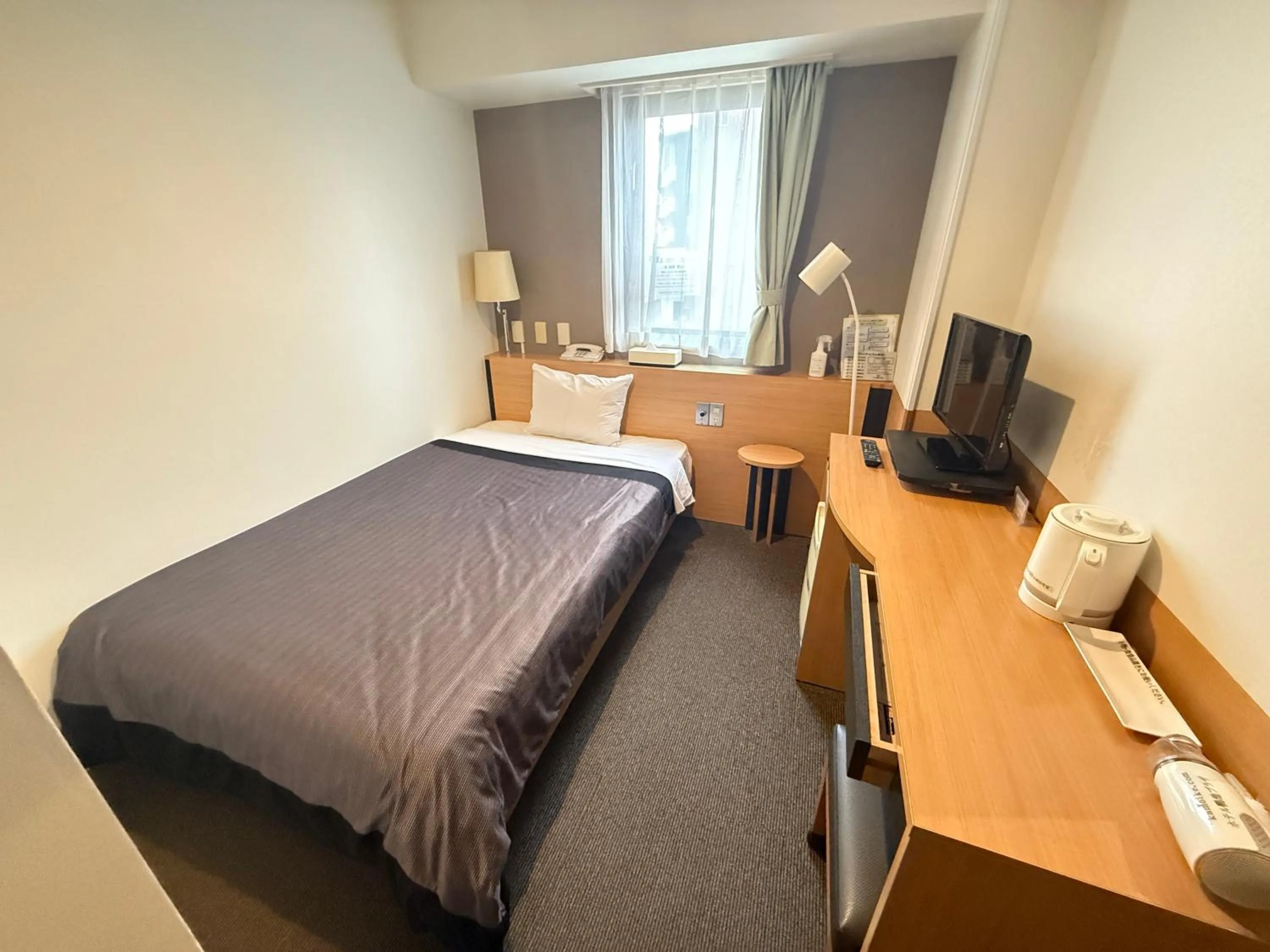 Bedroom in Hotel Kamoike Plaza