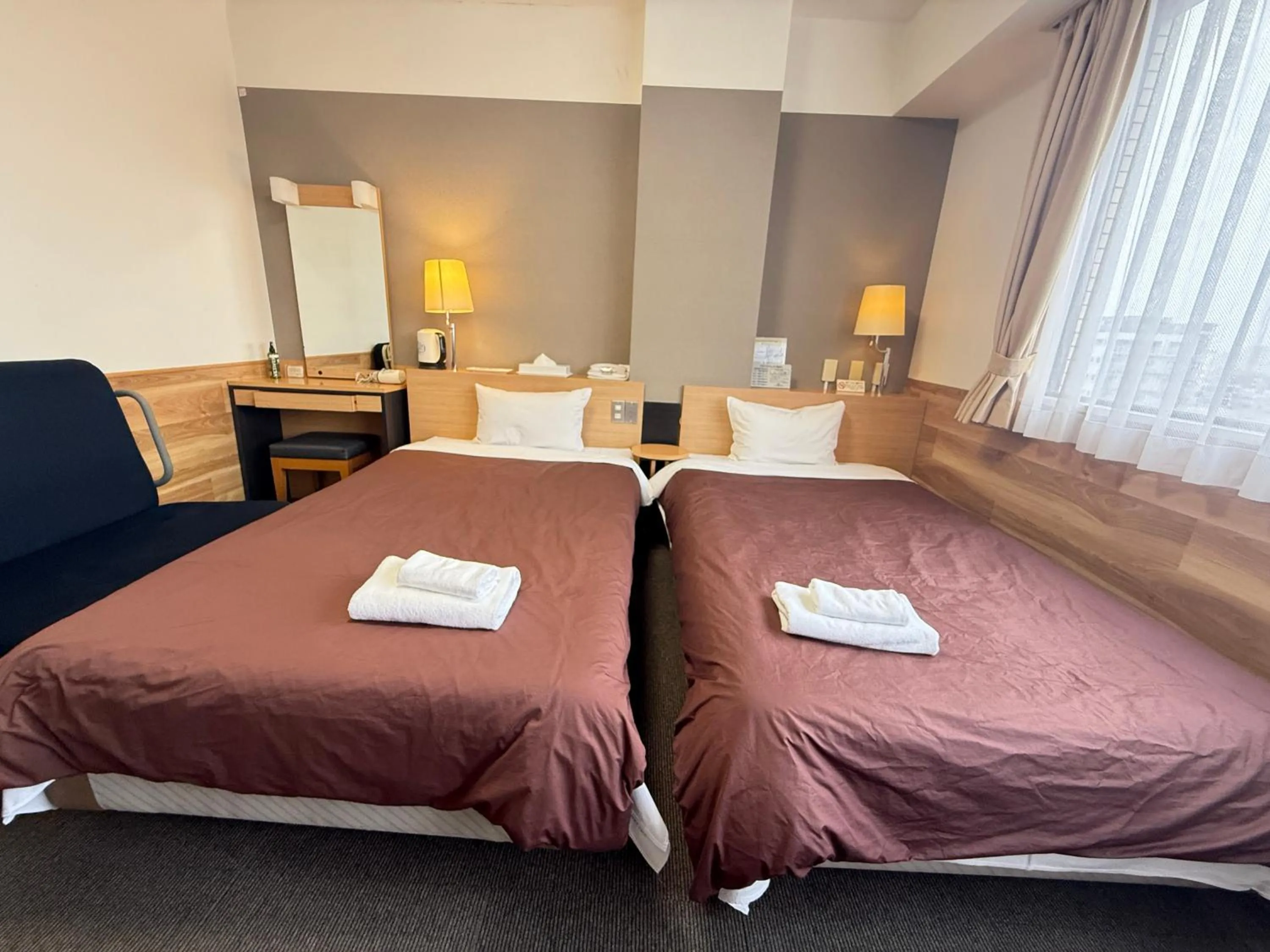 Bedroom in Hotel Kamoike Plaza