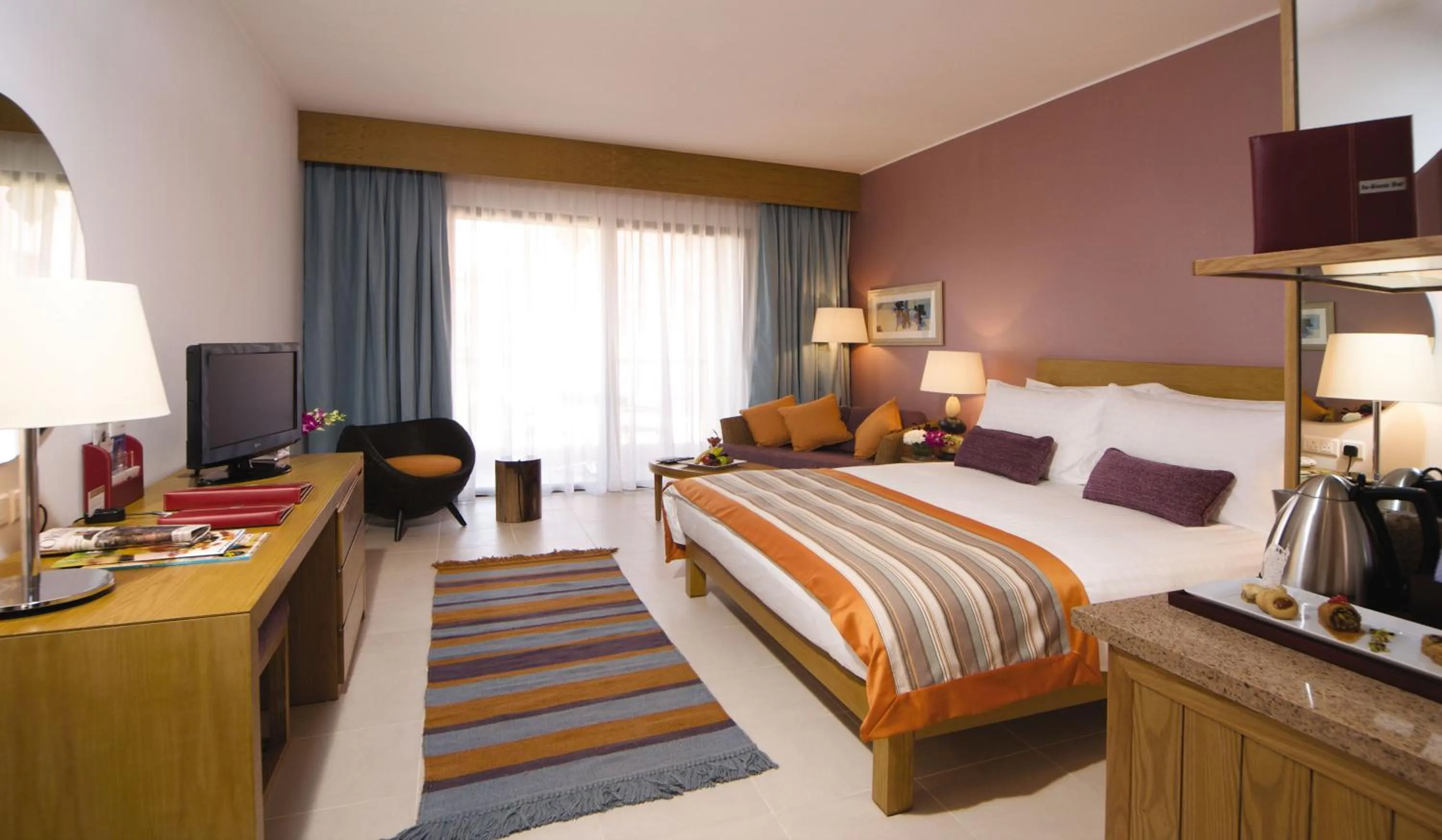 Photo of the whole room, Bed in Mövenpick Resort & Spa Tala Bay Aqaba
